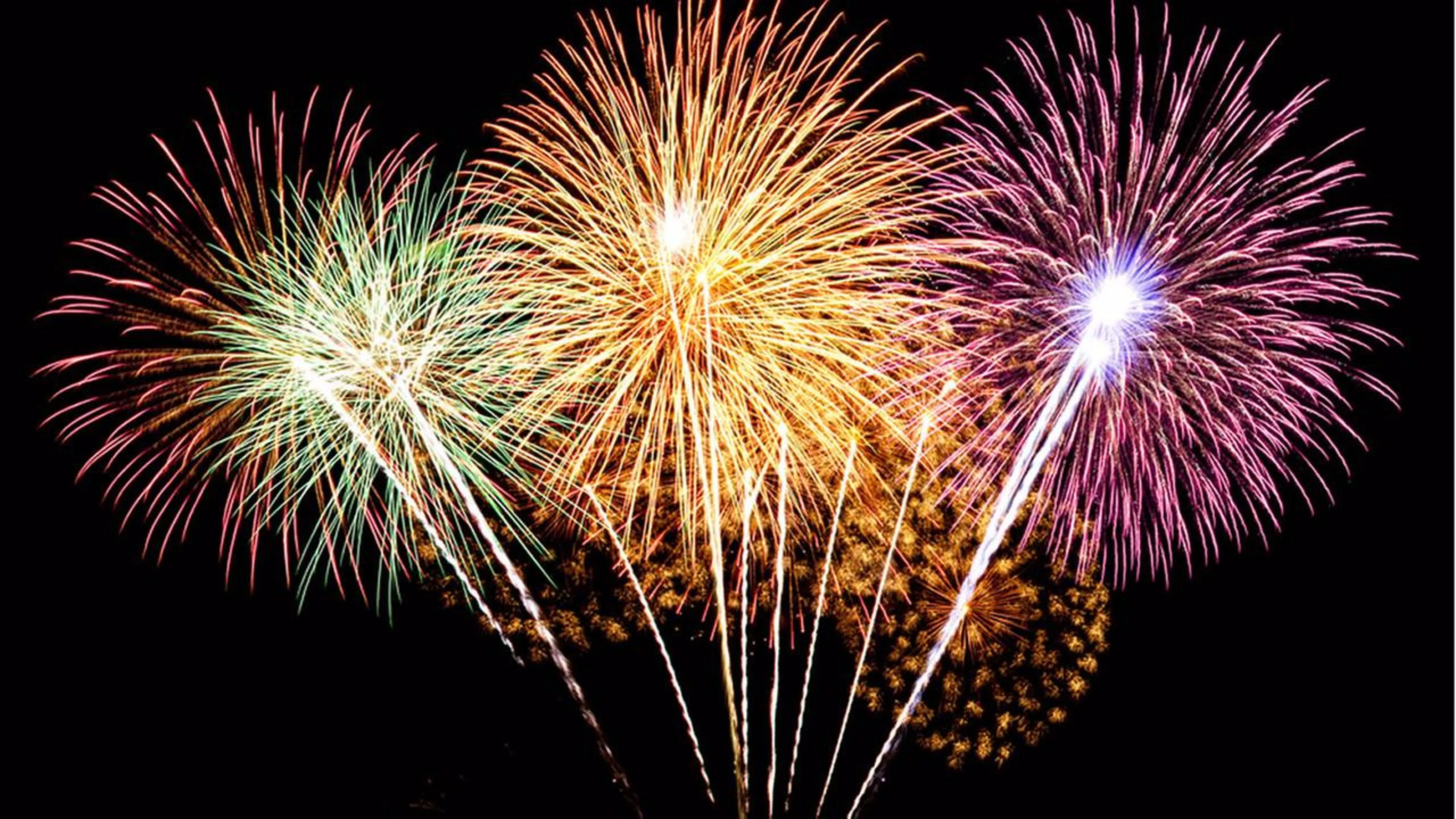 Vibrant fireworks creating a spectacular show at night