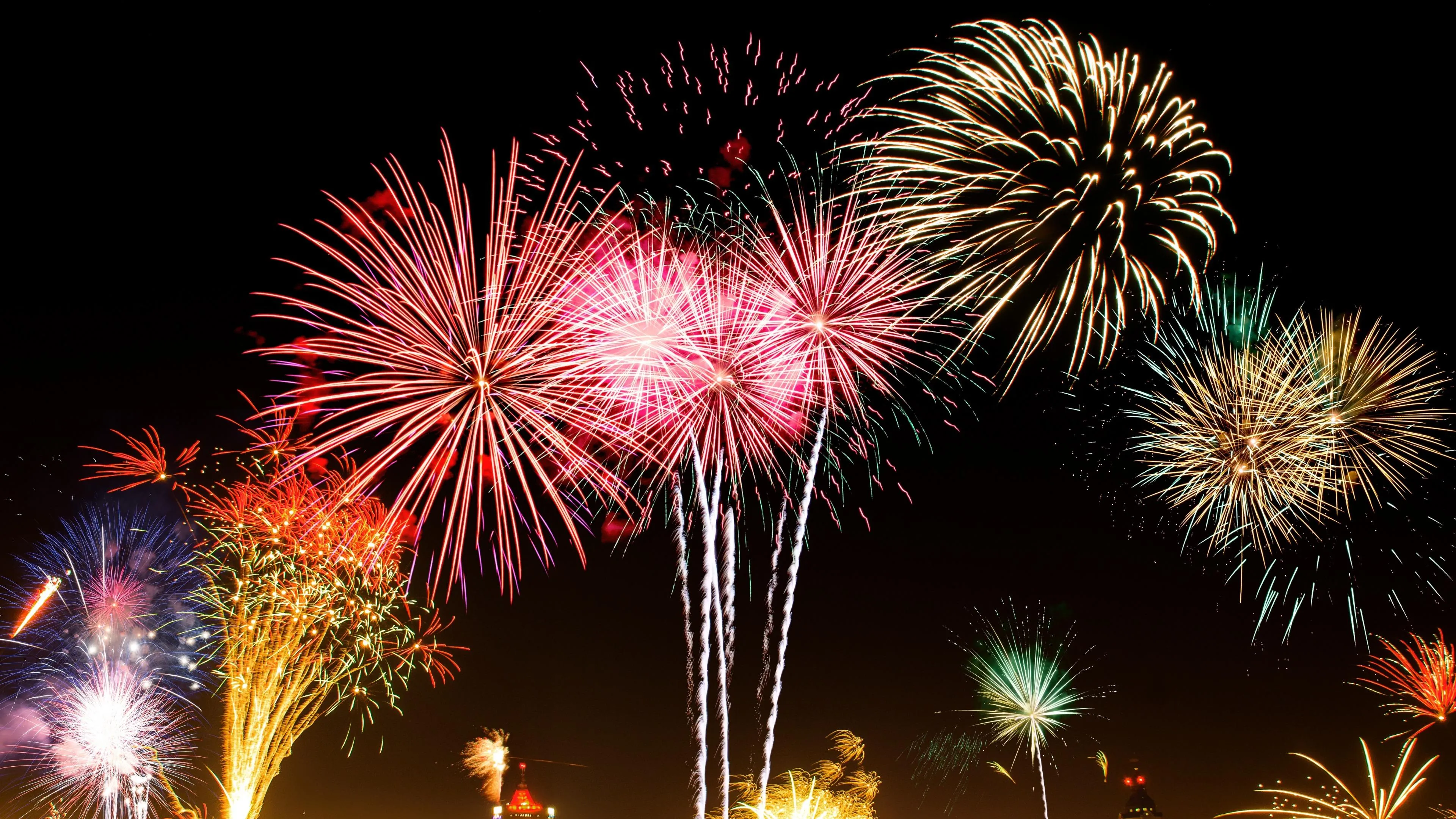 Vibrant fireworks lighting up the night with brilliance