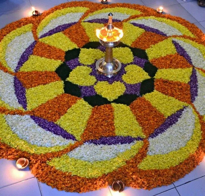 Vibrant rangoli with a spiral pattern on the outer Wallpaper