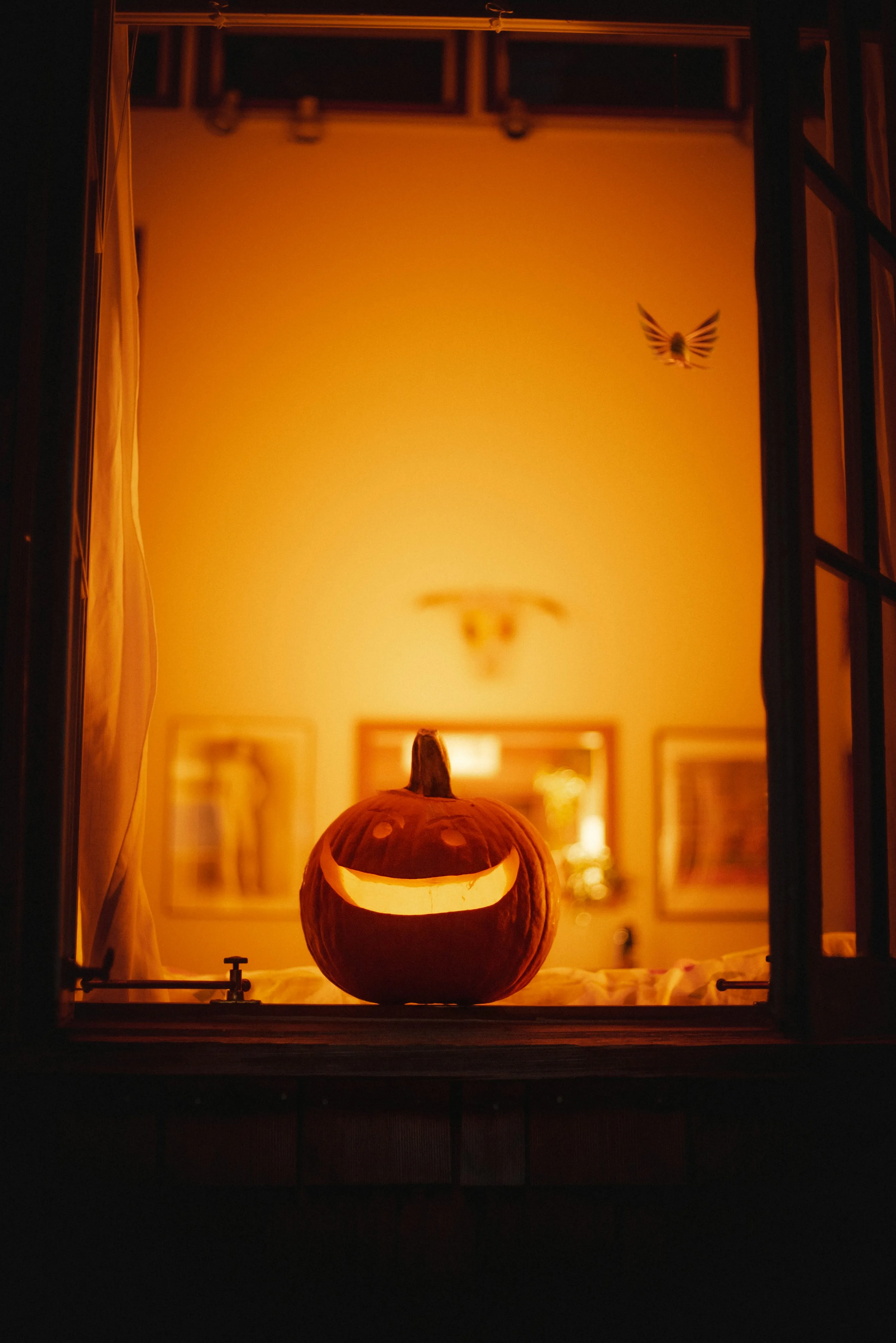 Warm Glowing Pumpkin Lantern in Cozy Indoor Setting
