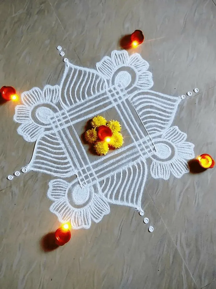 White Kolam design with Marigold and Diya free wallpaper