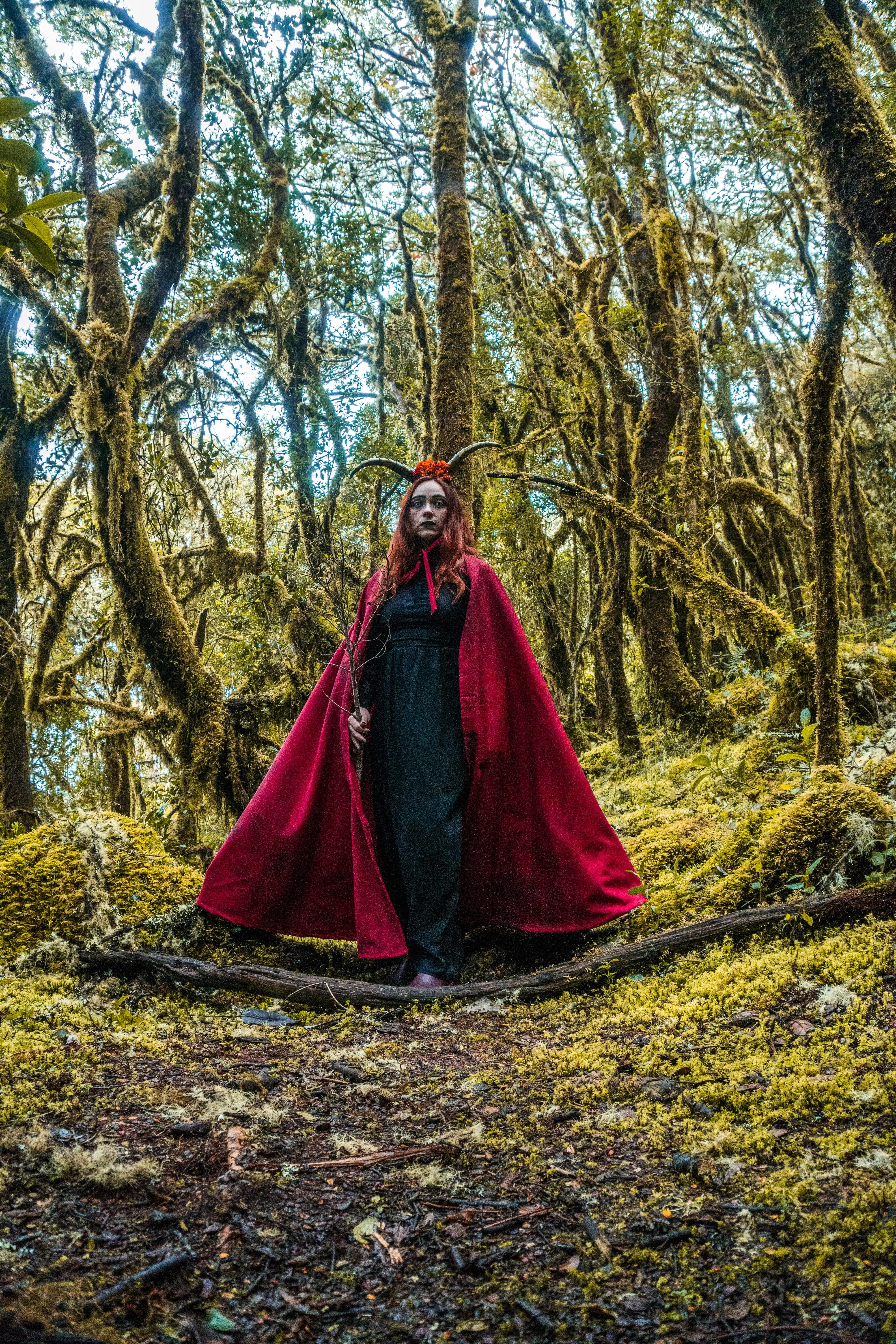 Witch Costume in Enchanted Forest Setting Wallpaper