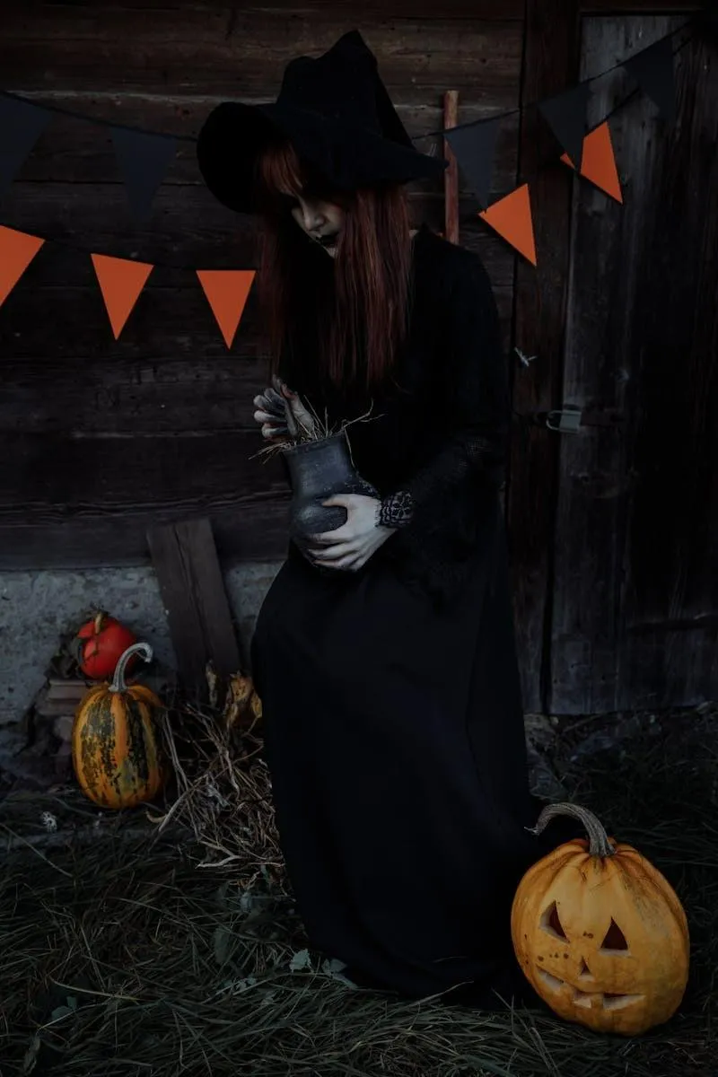 Witch Costume with Pumpkin Lantern in Dark Halloween Image