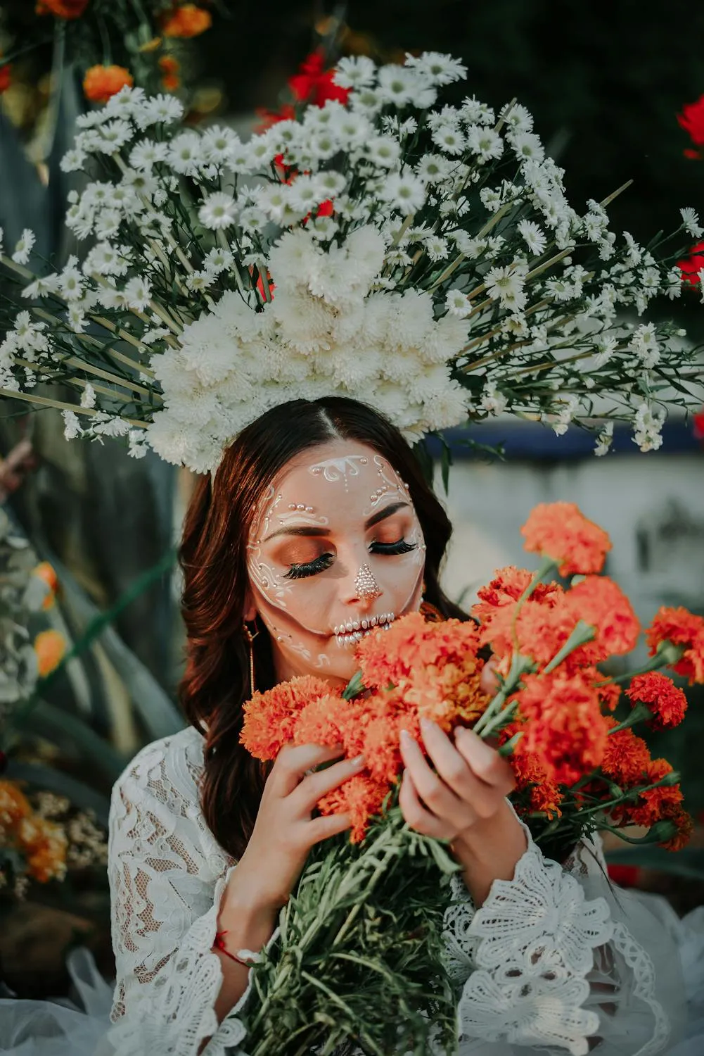 Woman Enjoying Flowers at Halloween Festival Wallpaper