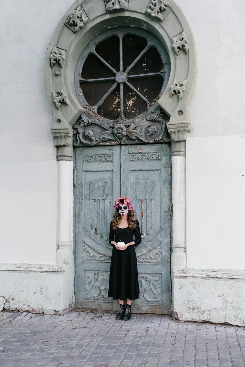 Woman in Black by Gothic Door for Halloween Wallpaper