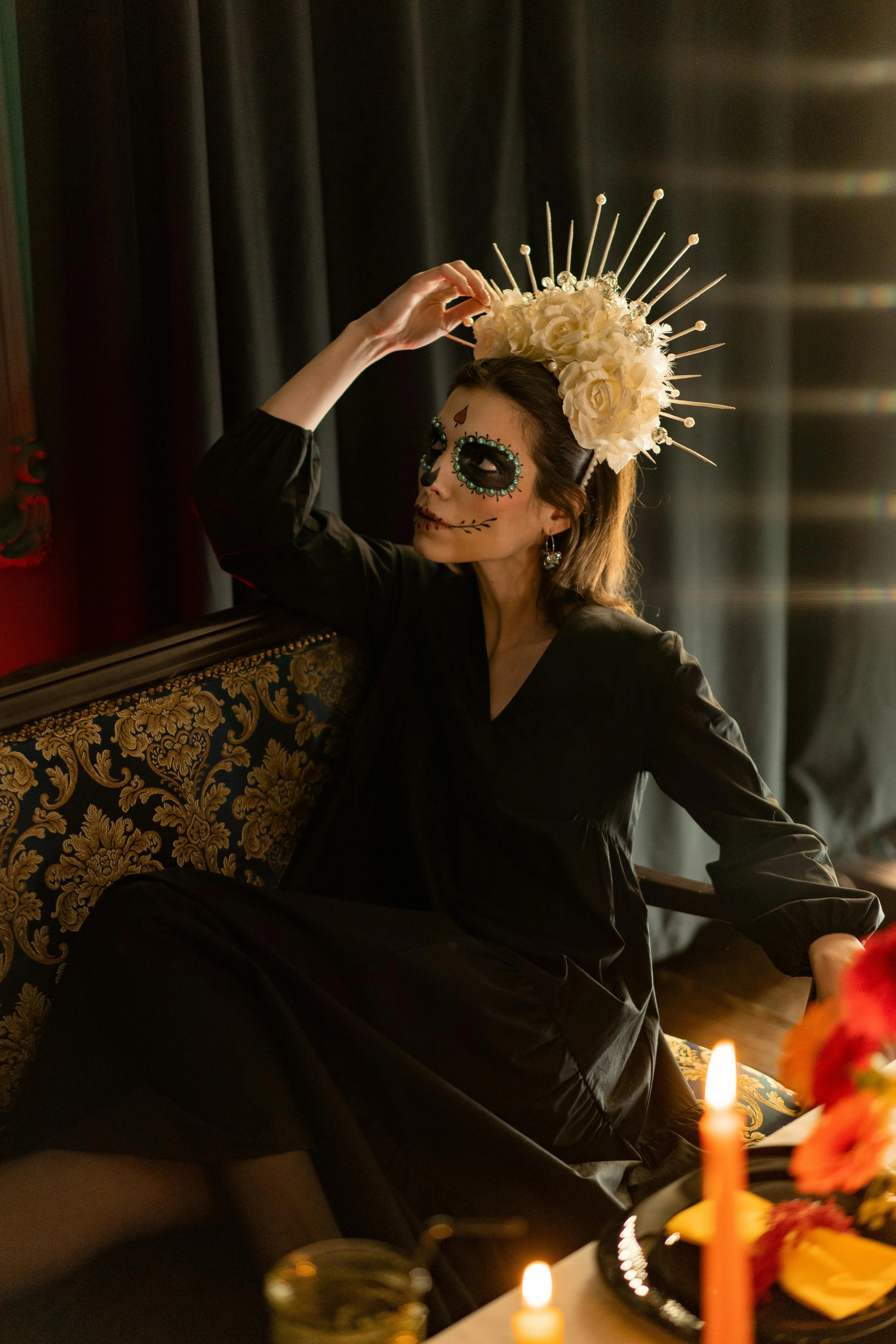 Woman in Black Dress with Candlelight Makeup Wallpaper
