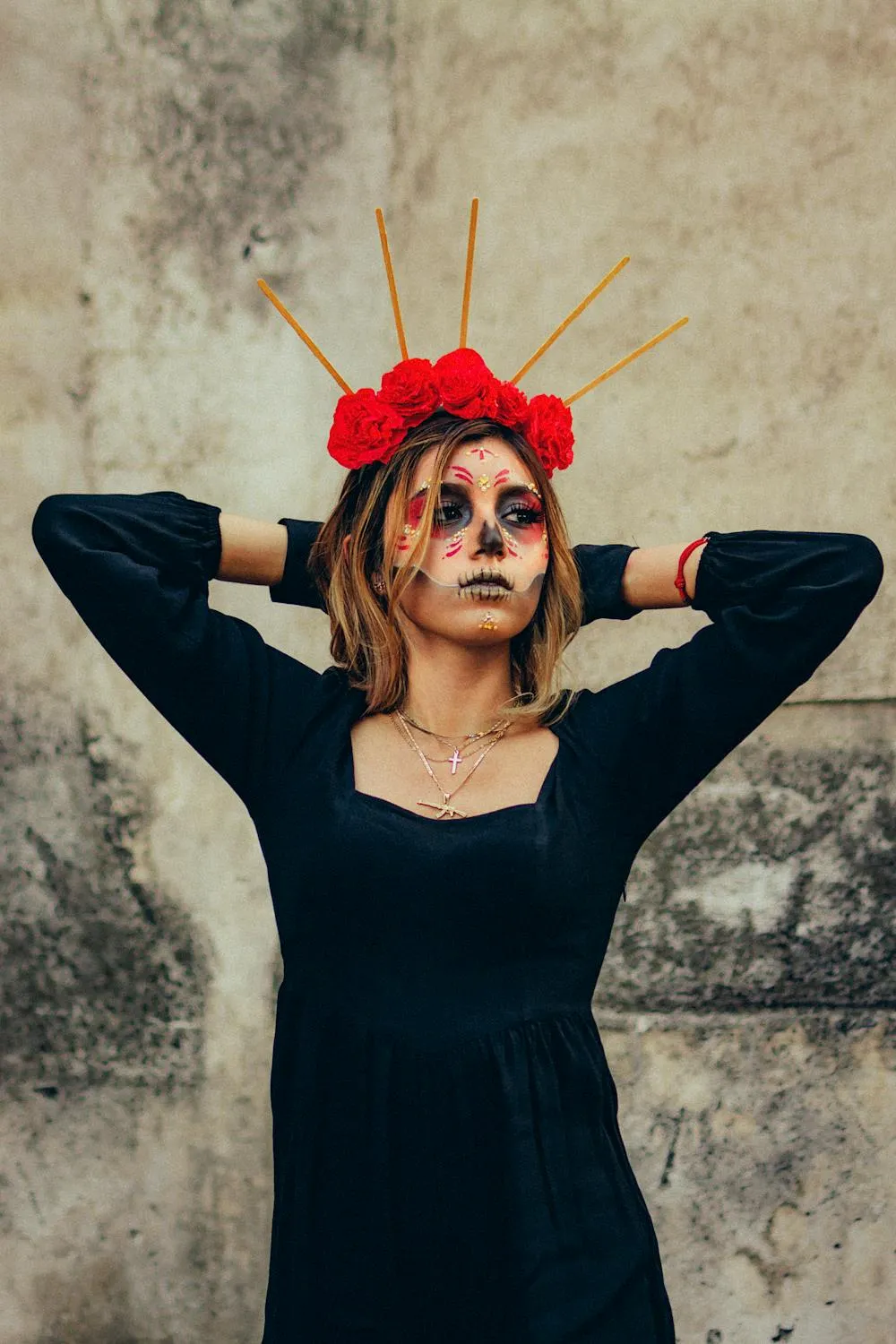 Woman in Black Dress with Red Flower Crown Pose Wallpaper