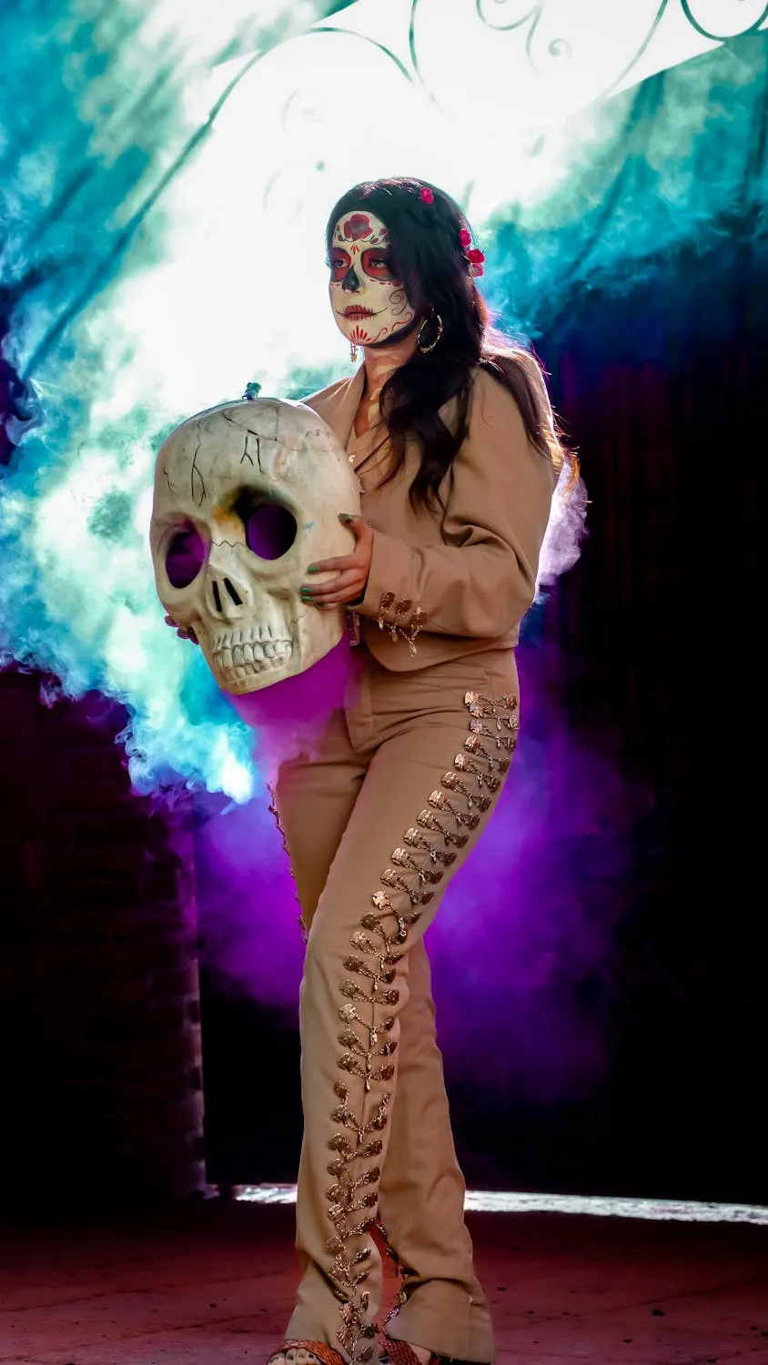 Woman in Costume with Skull Mask and Colorful Smoke