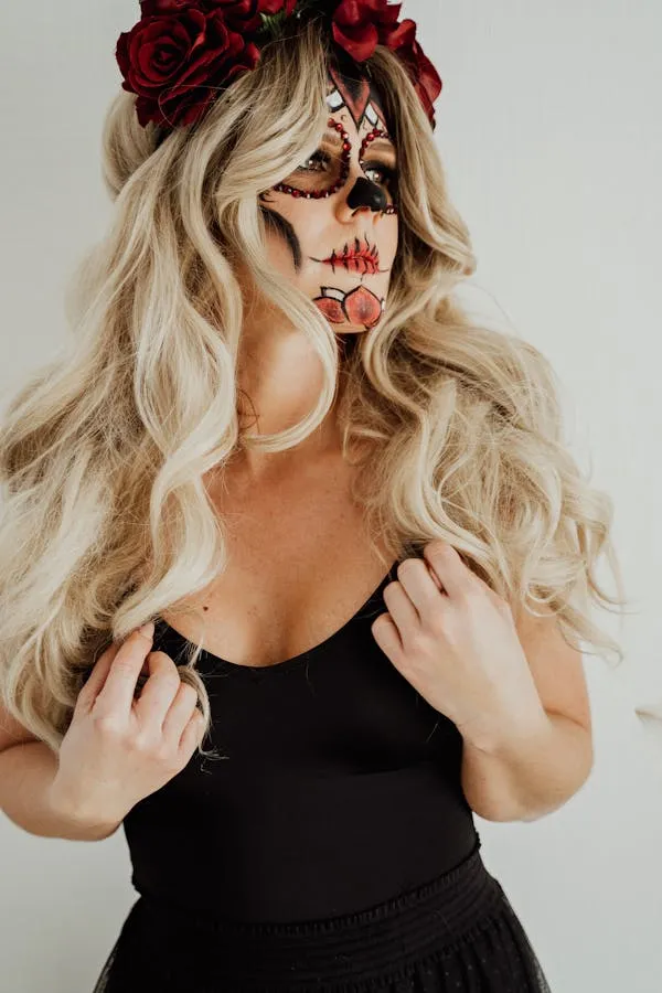 Woman in Day of the Dead Makeup with Roses on Headband