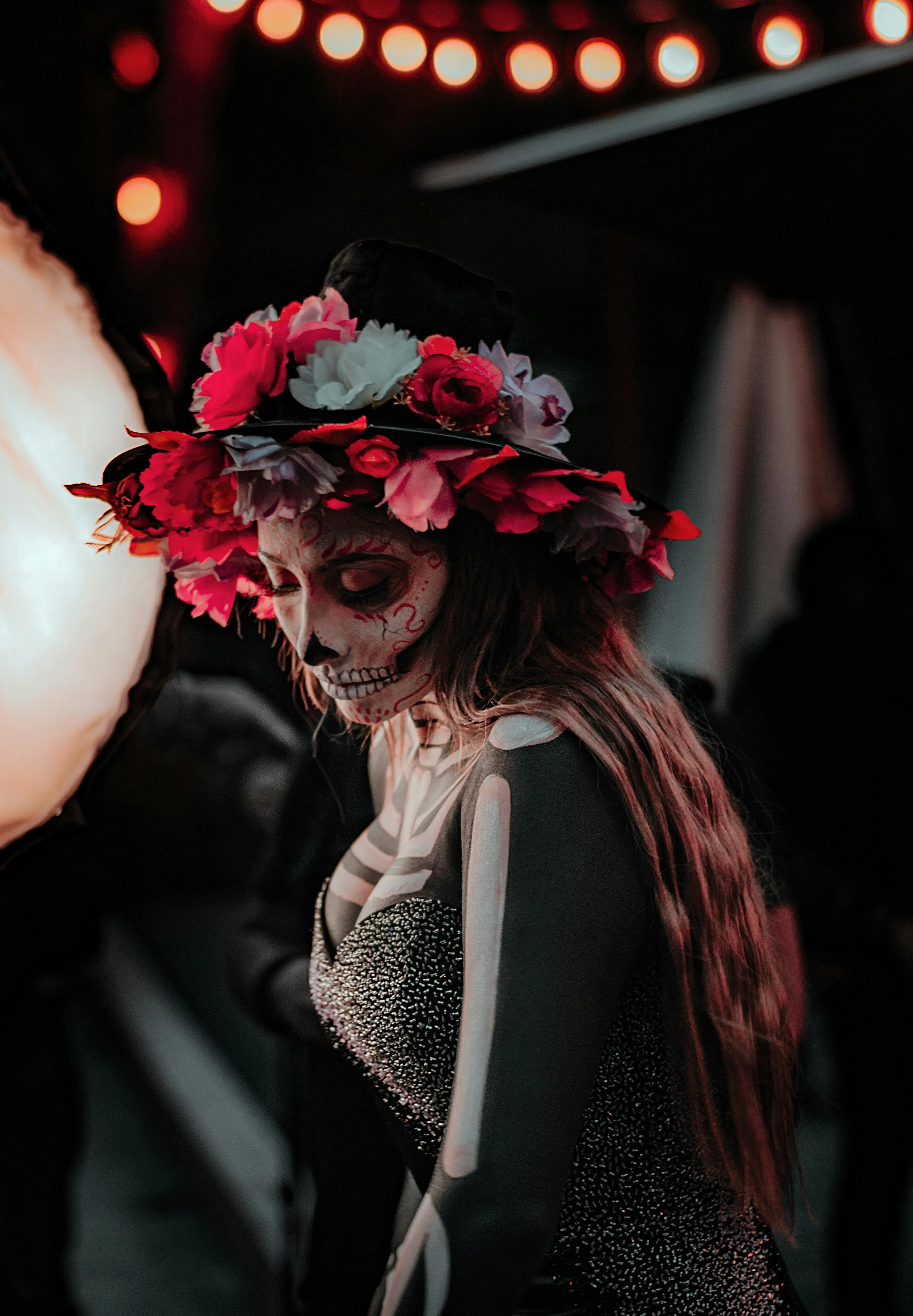 Woman in Floral Crown and Gothic Halloween Makeup image