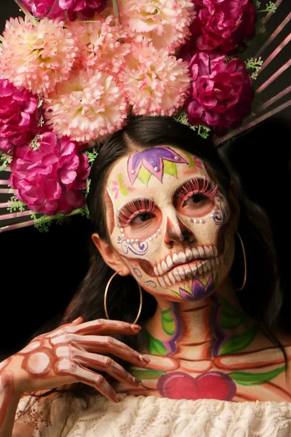 Woman in Floral Day of the Dead Makeup with Rose Crown