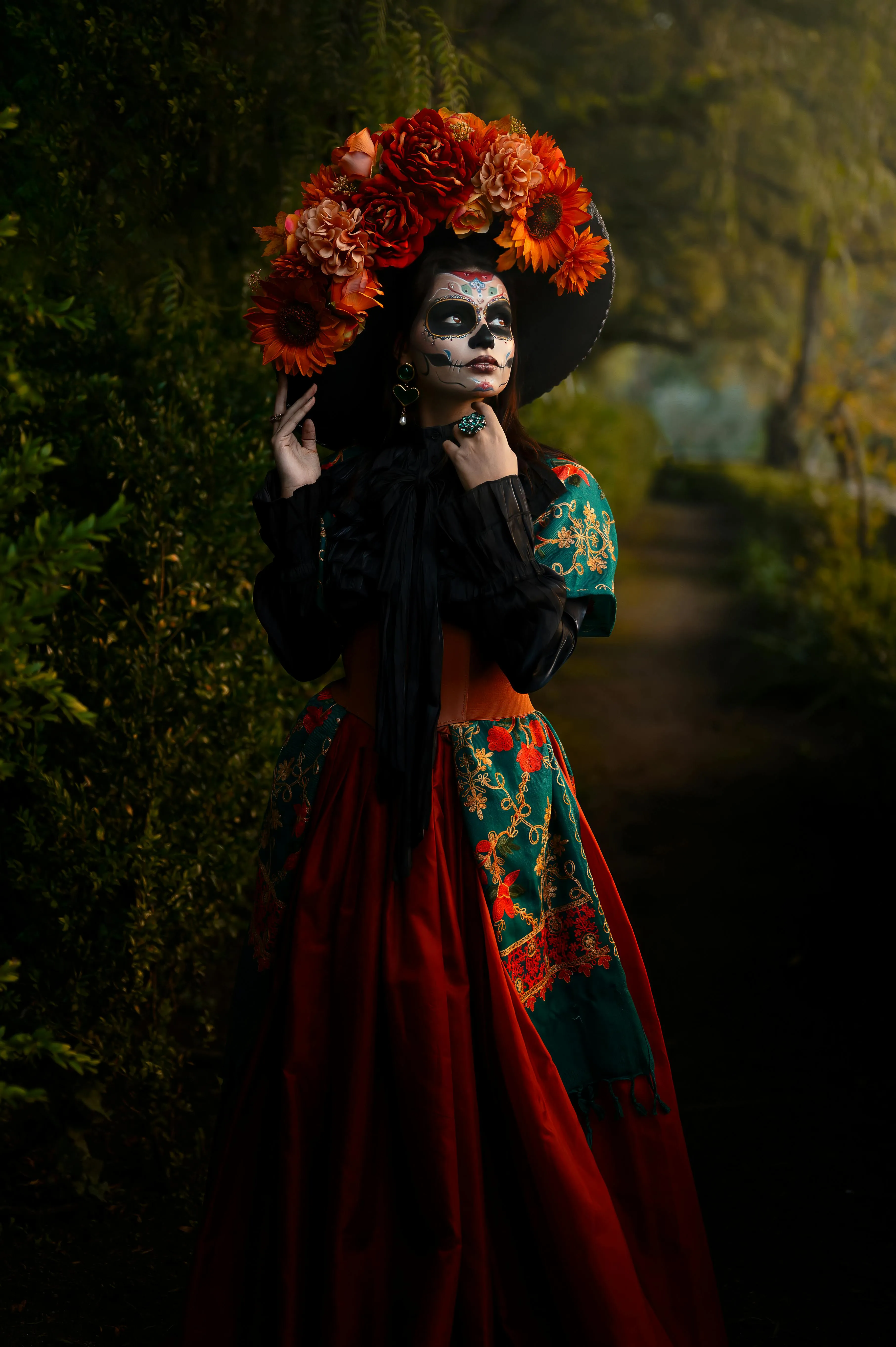 Woman in Floral Skull Makeup with Dark Background HD