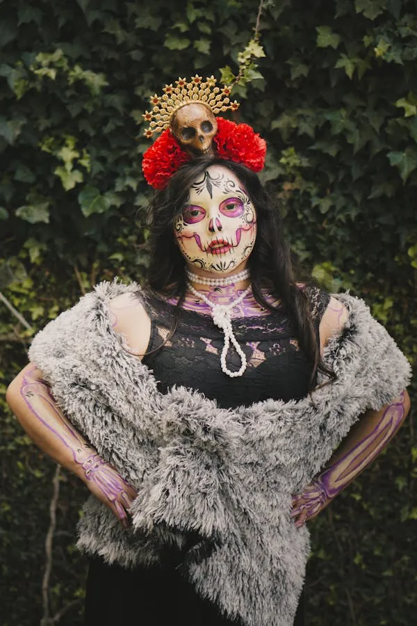 Woman in flower crown and skull makeup festive vibes