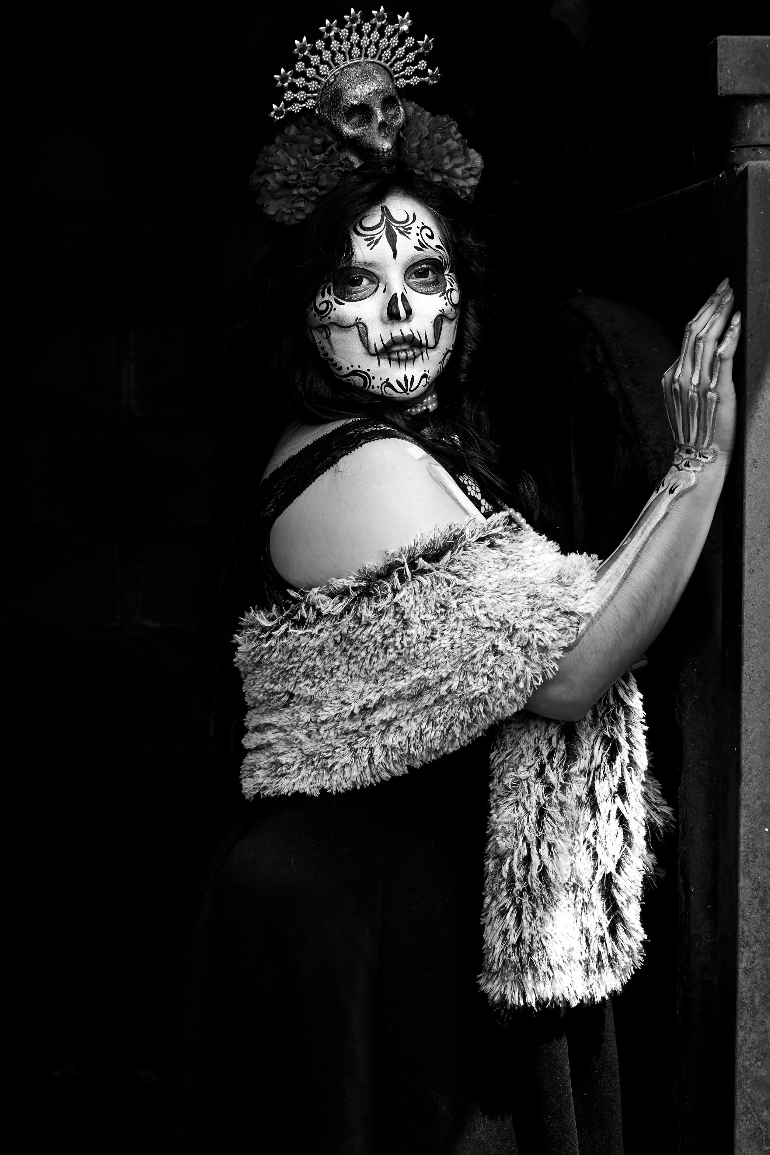 Woman in Lace Dress and Floral Crown with Halloween Makeup
