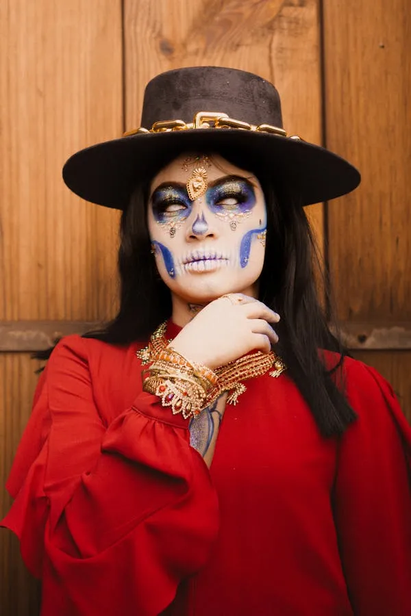 Woman in red dress with classic sugar skull makeup image
