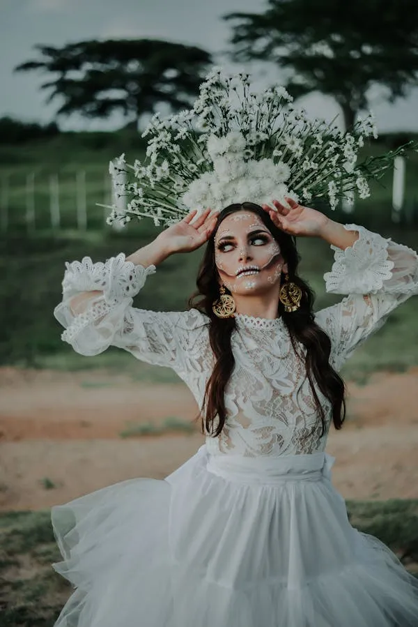 Woman in White Gown with Flowery Headpiece in the Forest