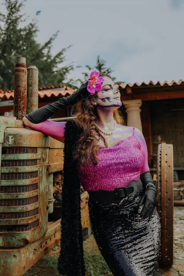 Woman Wearing Day of the Dead Makeup and Pink Top Outdoors