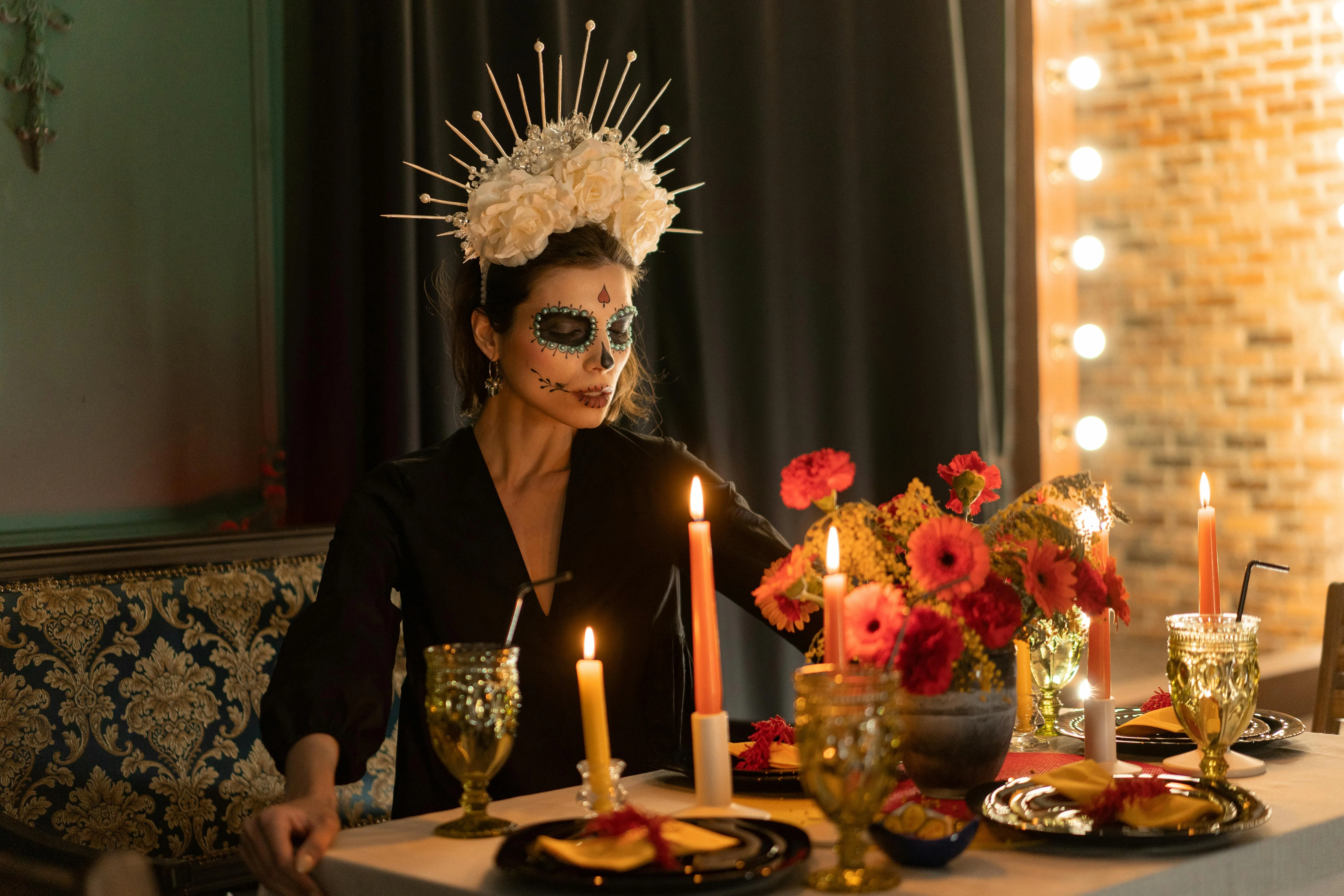 Woman Wearing Day of the Dead Makeup at Dinner image