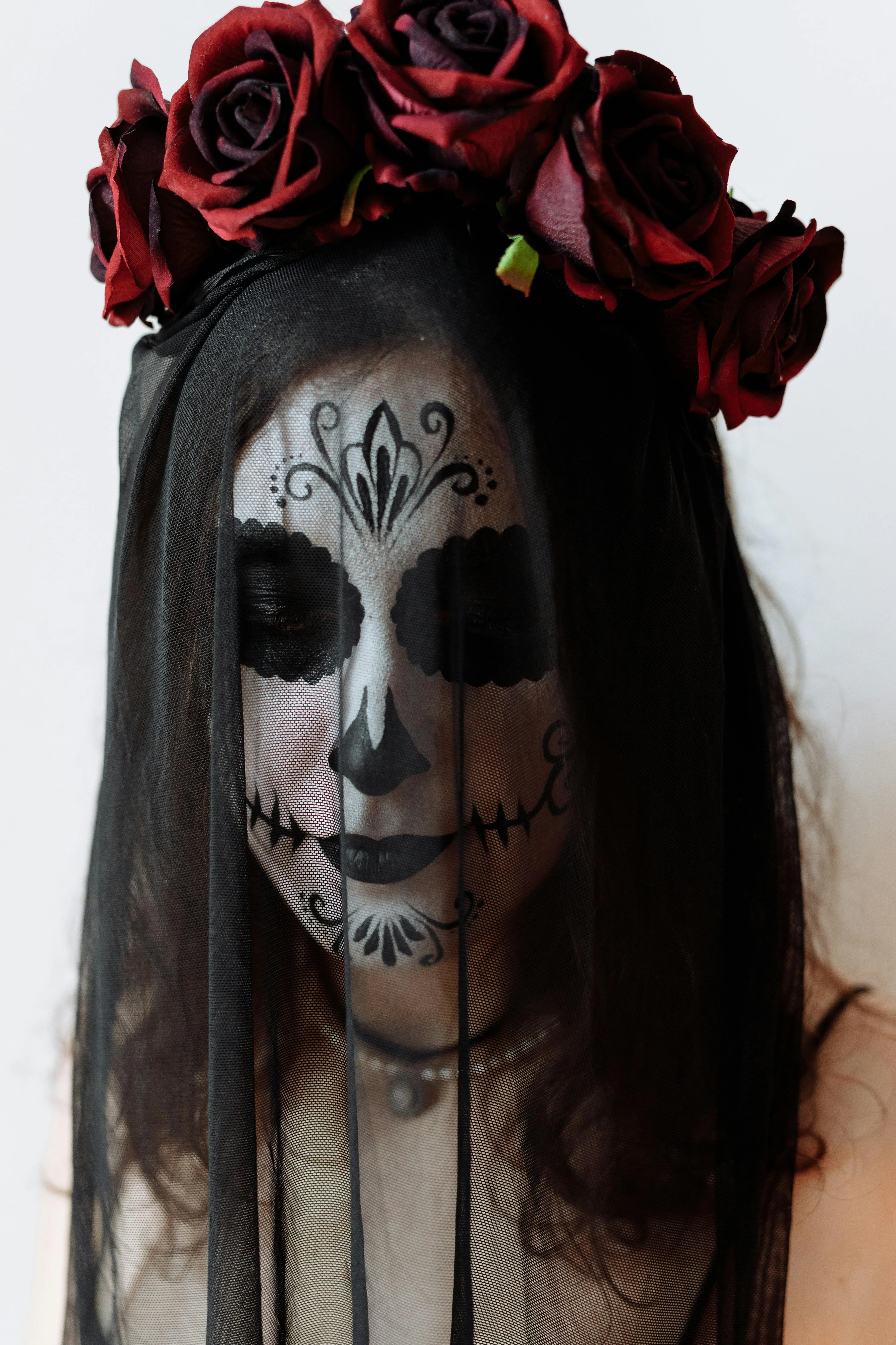Woman Wearing Floral Skull Veil and Halloween Makeup