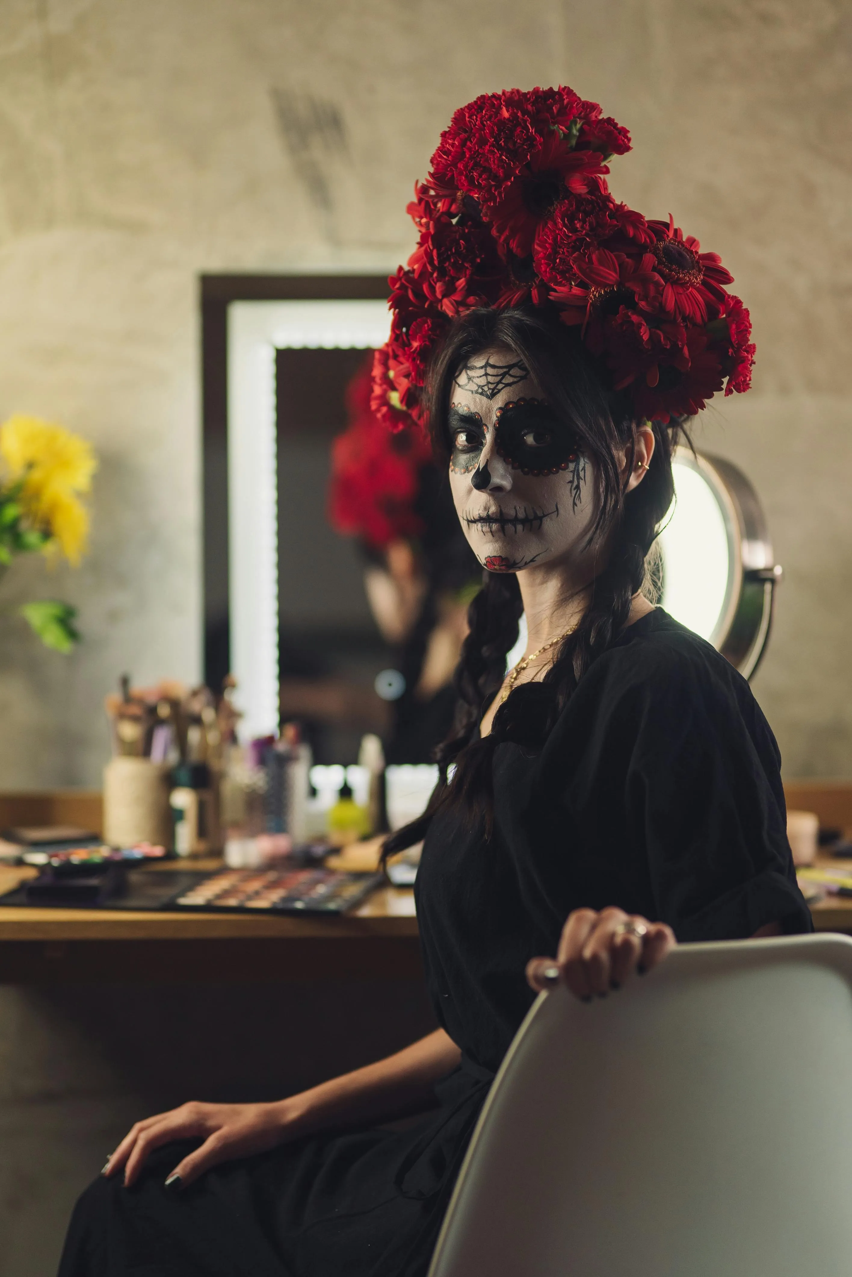 Woman Wearing Red Flower Crown Preparing Makeup image