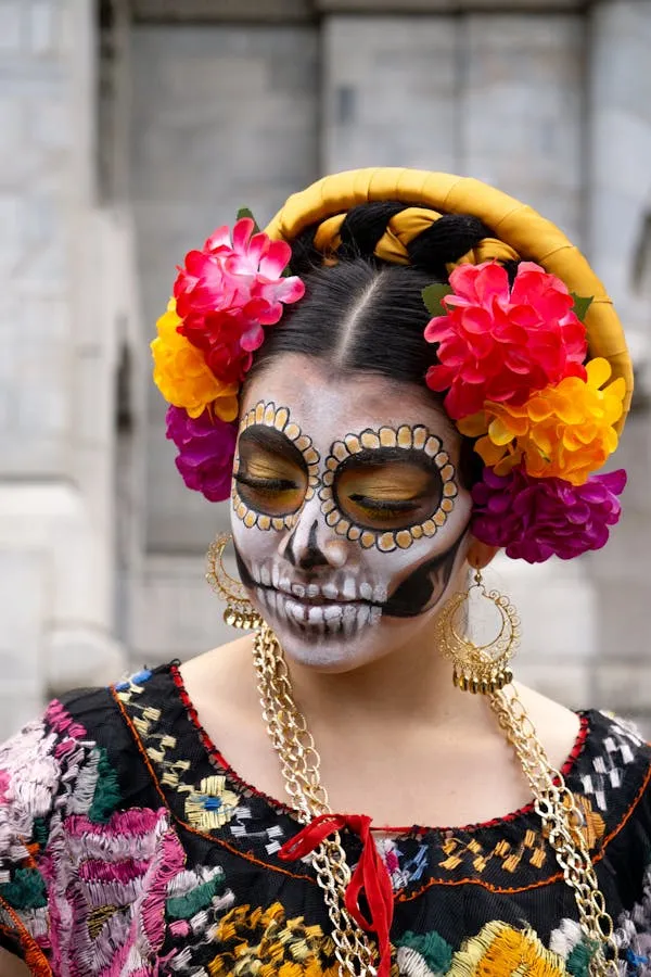 Woman with Colorful Floral Crown and Calavera Face Paint