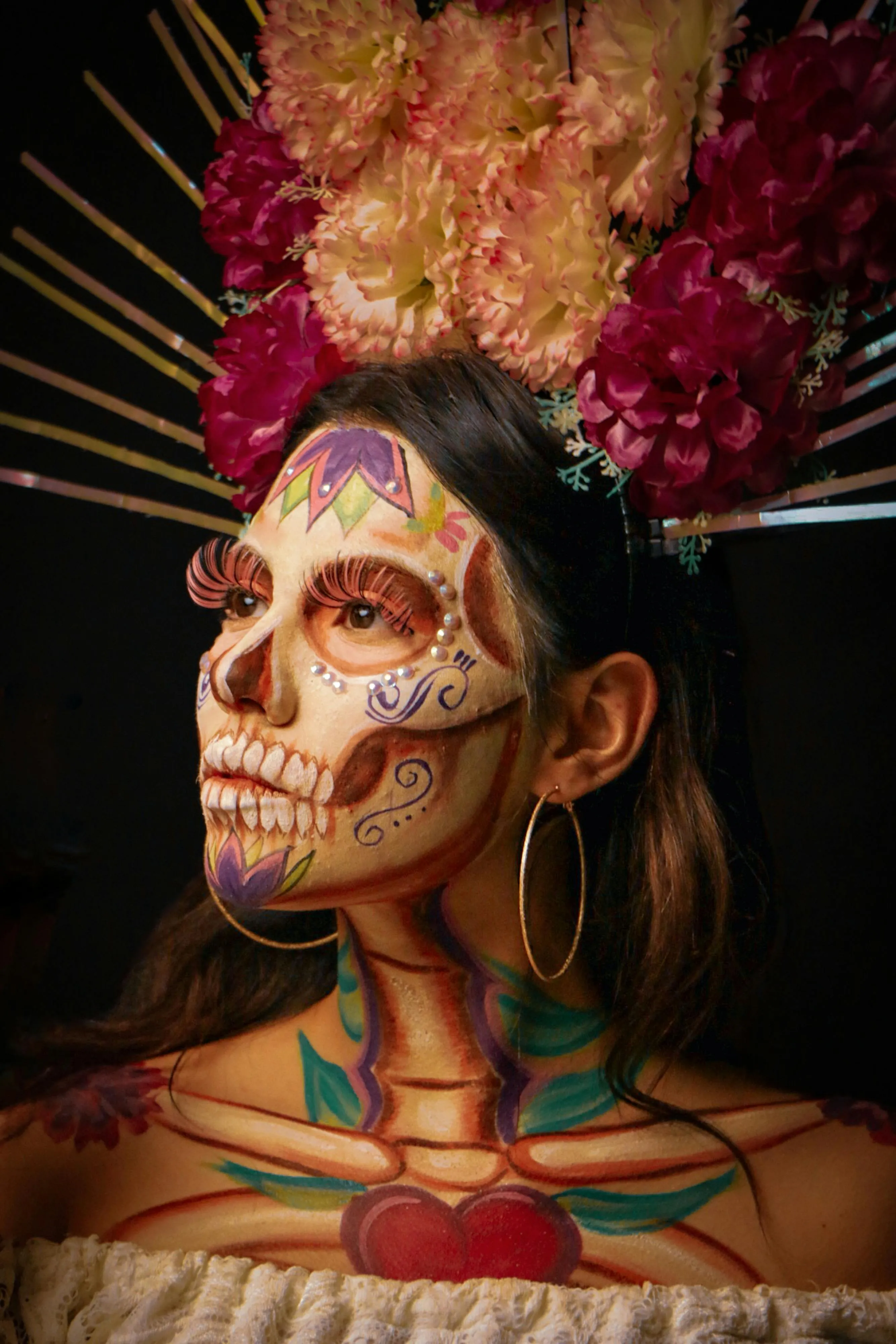 Woman with Colorful Floral Halloween Face Paint Wallpaper