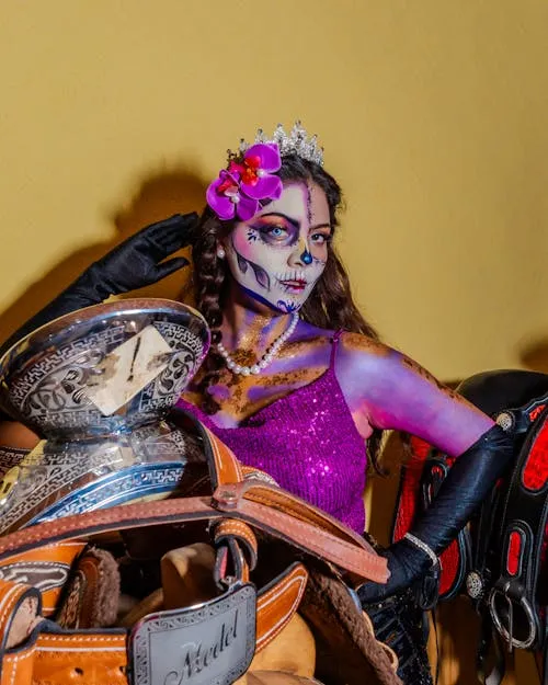 Woman with Colorful Skull Makeup and Spiked Shoulder Armor