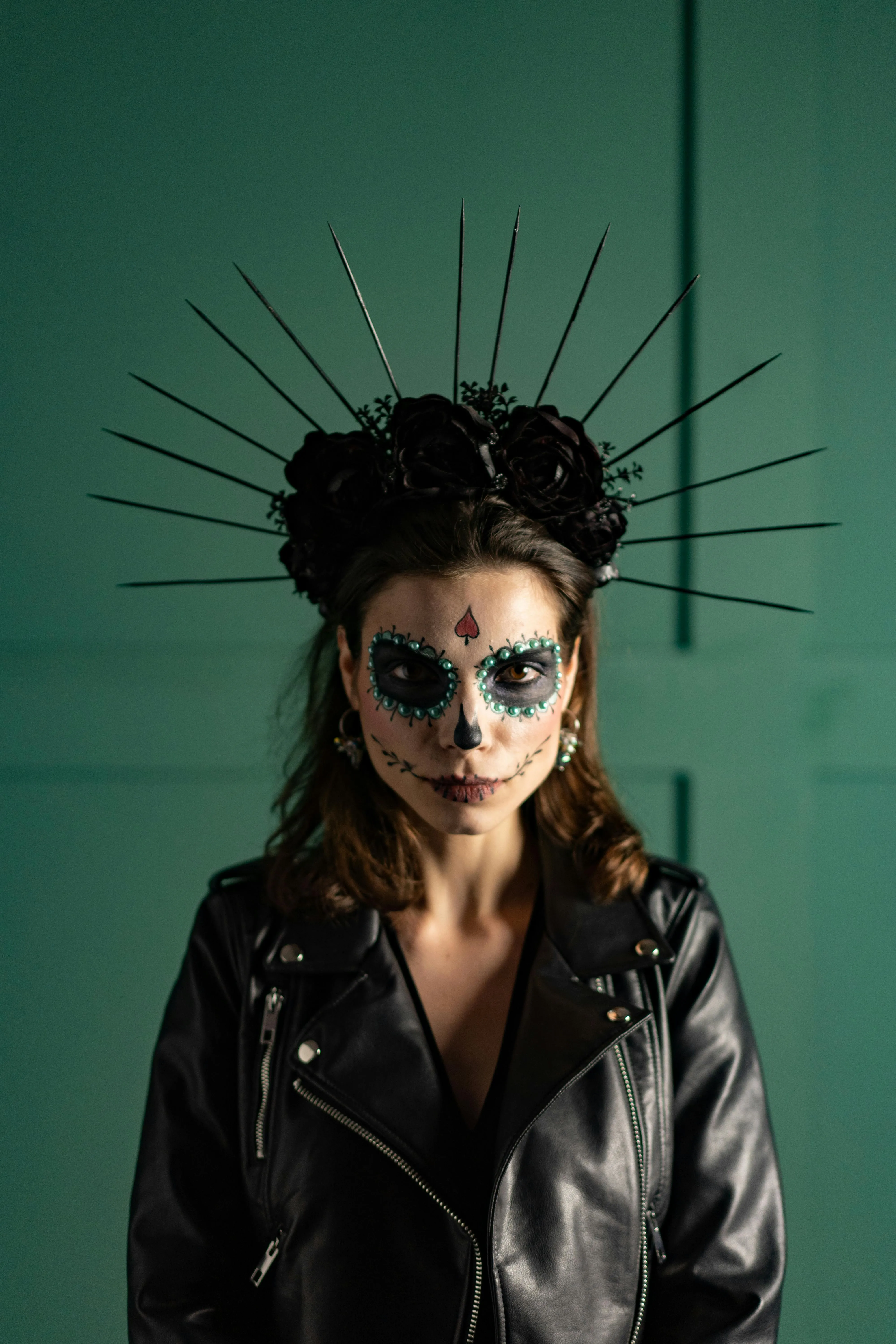 Woman with Crown and Skull Face in Halloween Portrait image