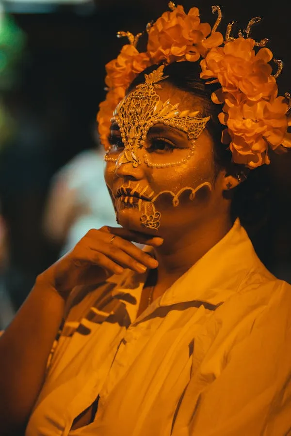 Woman with floral crown and yellow blouse at Halloween