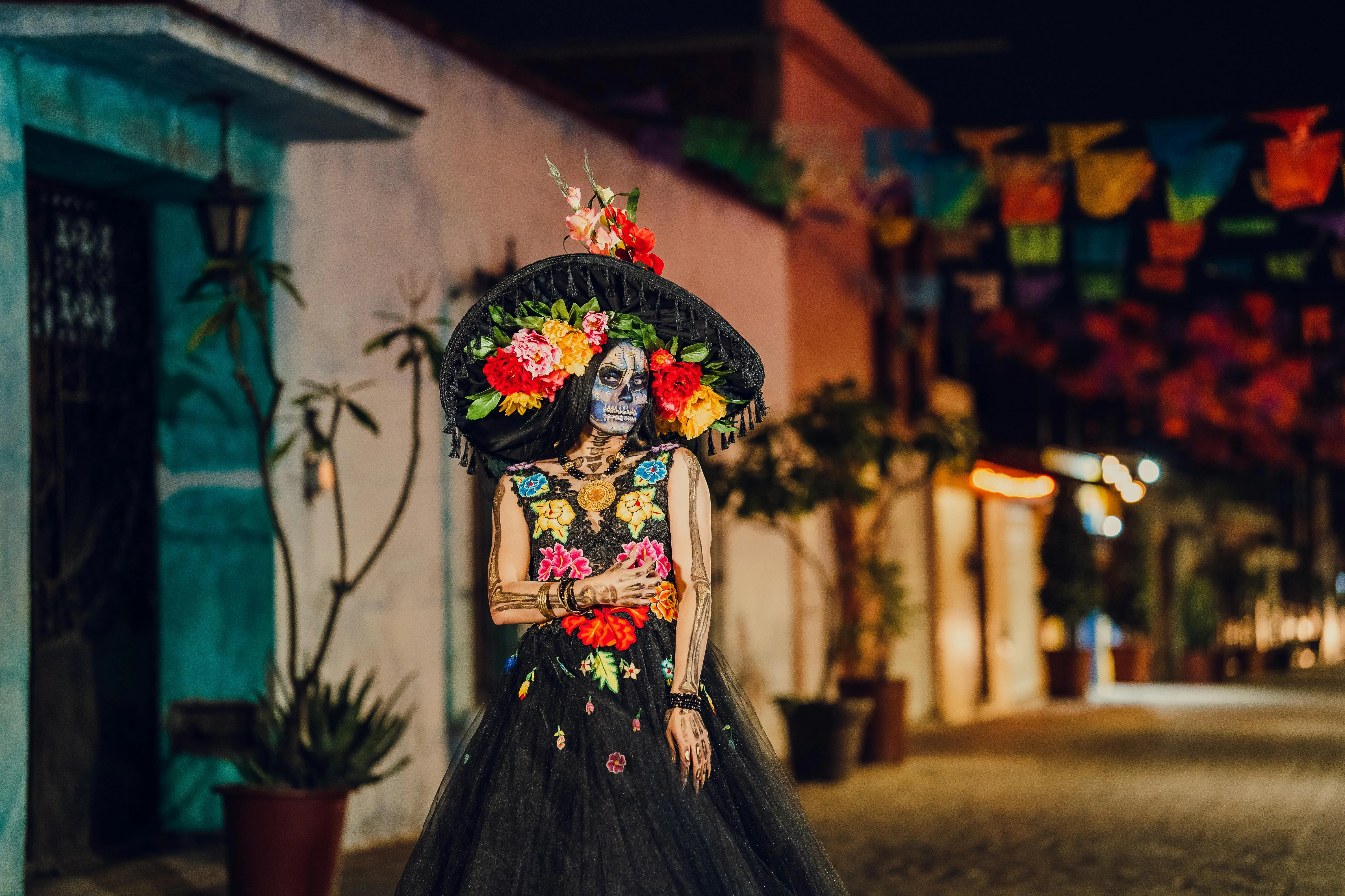Woman with Floral Skull Makeup Celebrating Halloween