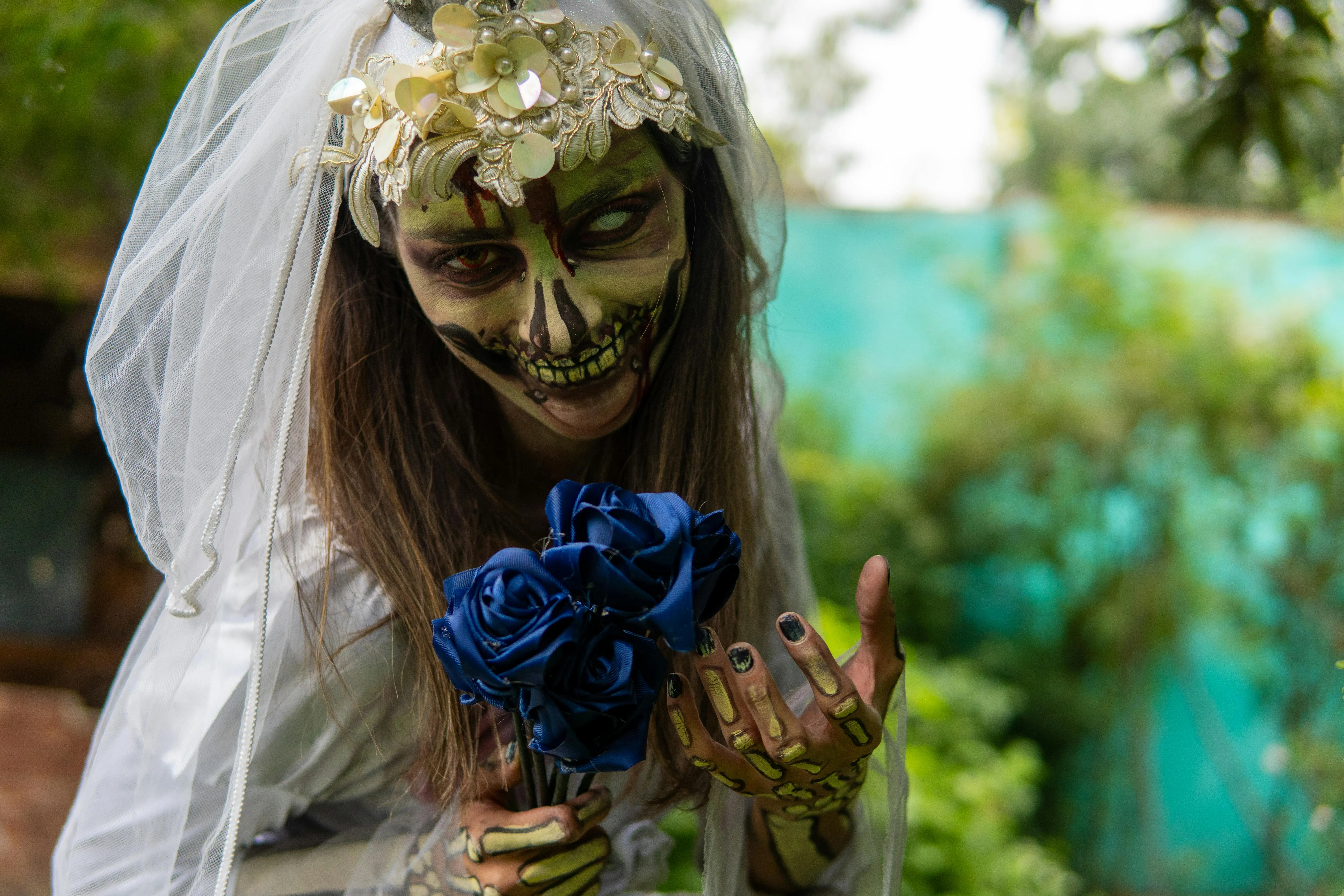 Woman with Flower Crown and Skull Face Makeup Wallpaper