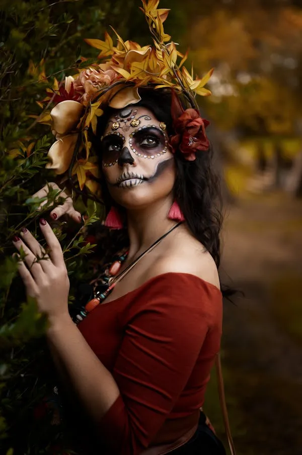 Woman with Flower Crown and Skull Makeup for Halloween