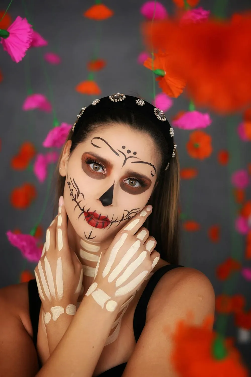 Woman with Halloween Face Paint Posing with Falling Petals