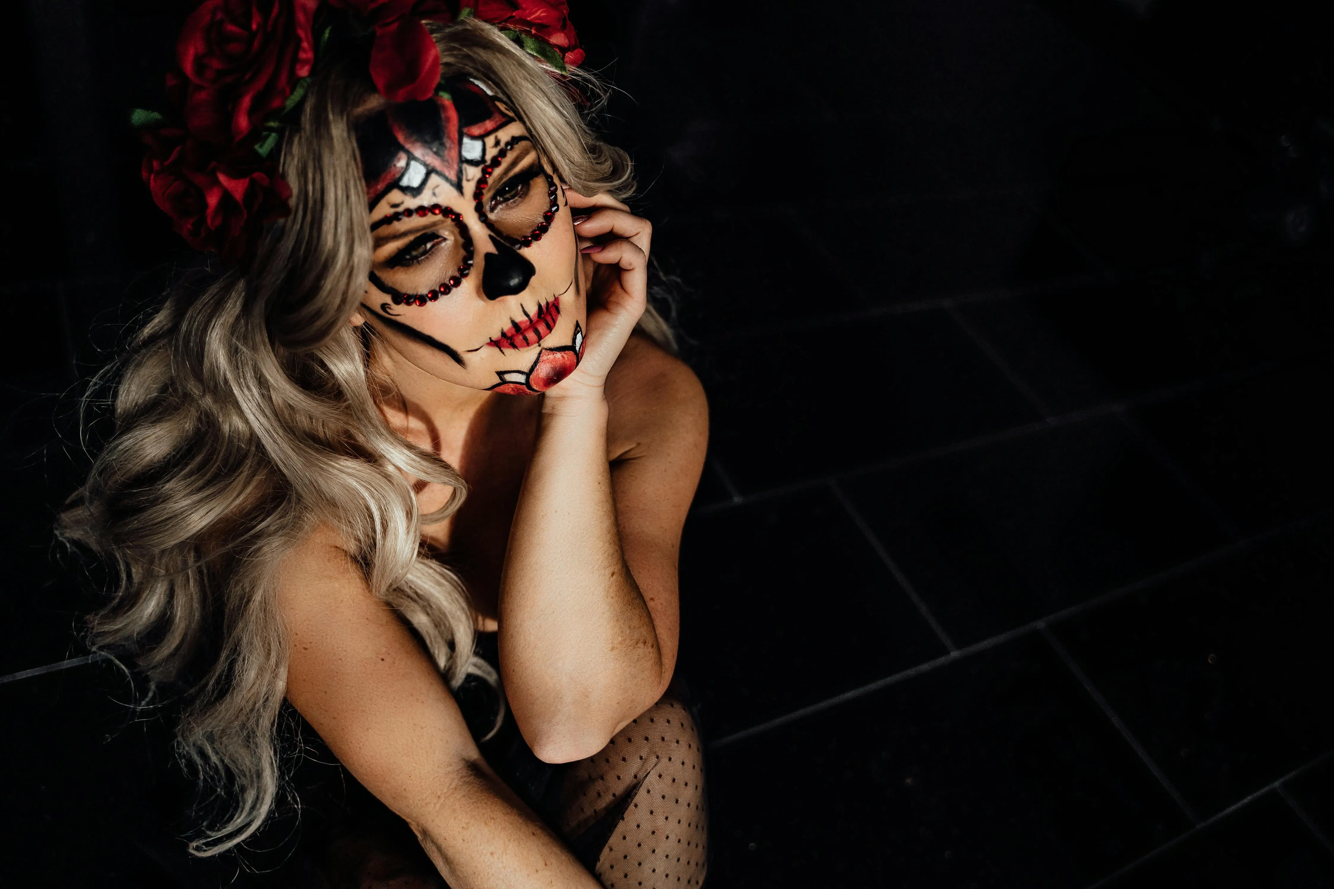 Woman with Intricate Sugar Skull Makeup Pose Wallpaper