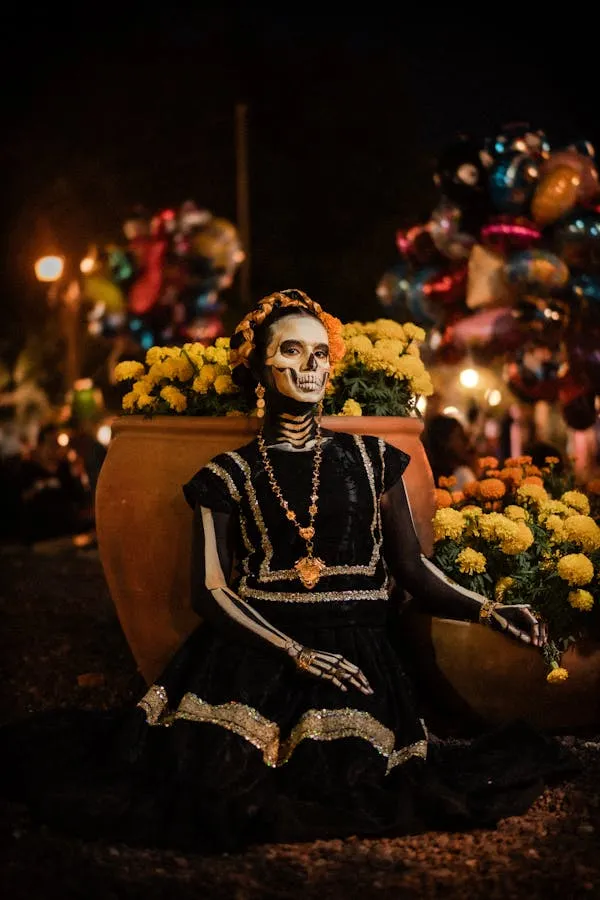 Woman with Marigolds in dark scene wearing black costume