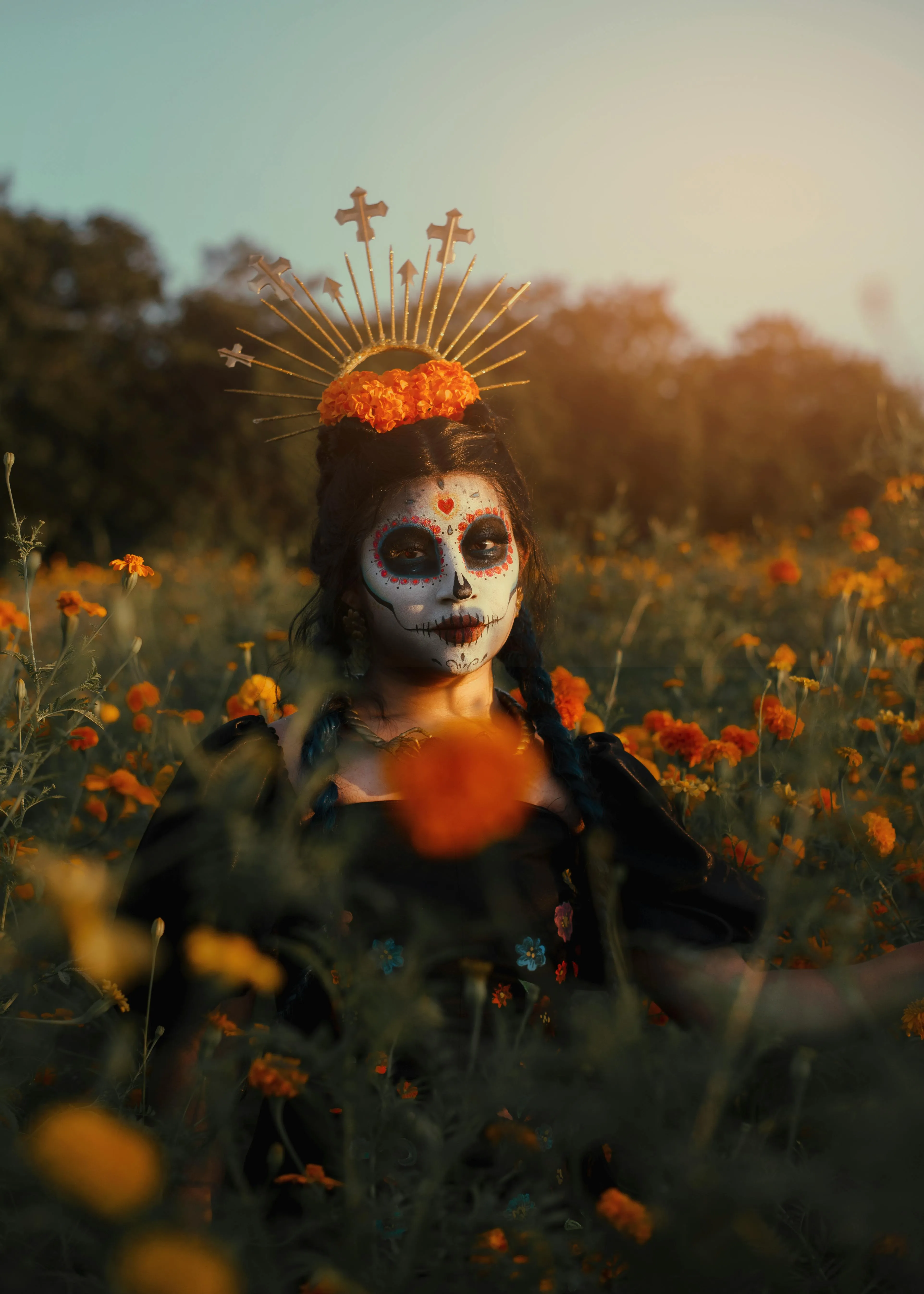 Woman with Orange Flowers and Skull Face Paint image