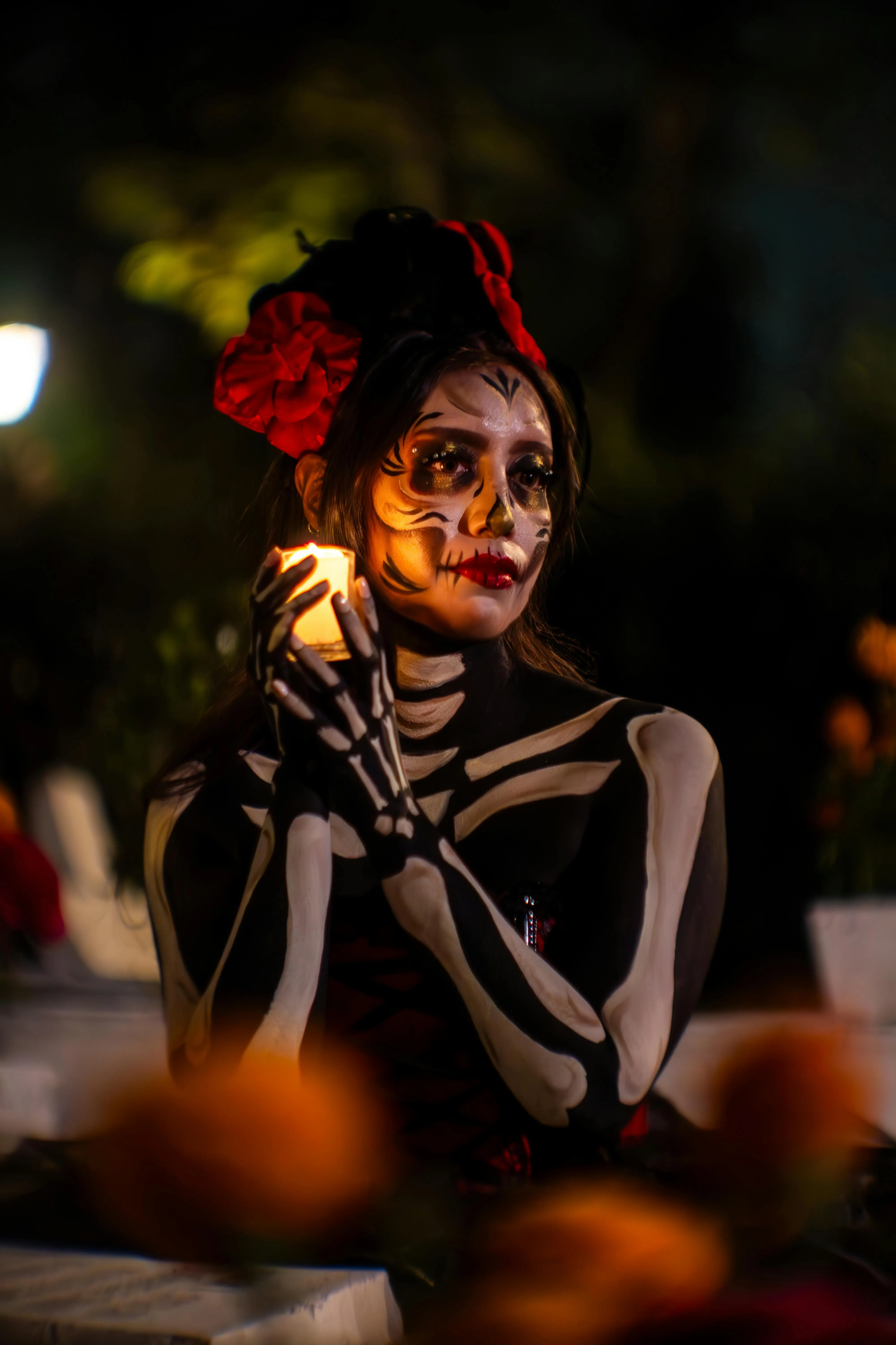 Woman with Painted Skeleton Face at Halloween Festival