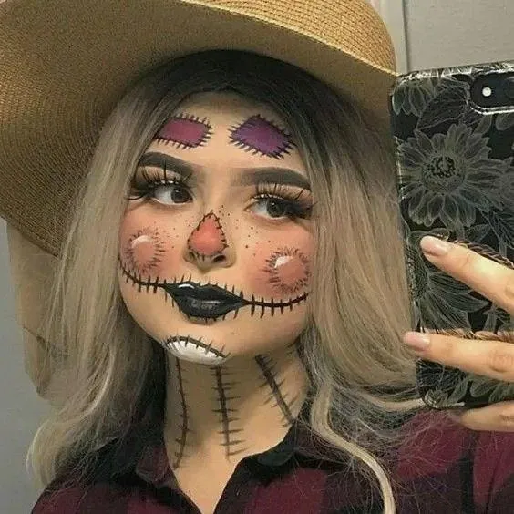 Woman with Scarecrow Makeup at Halloween Festival image