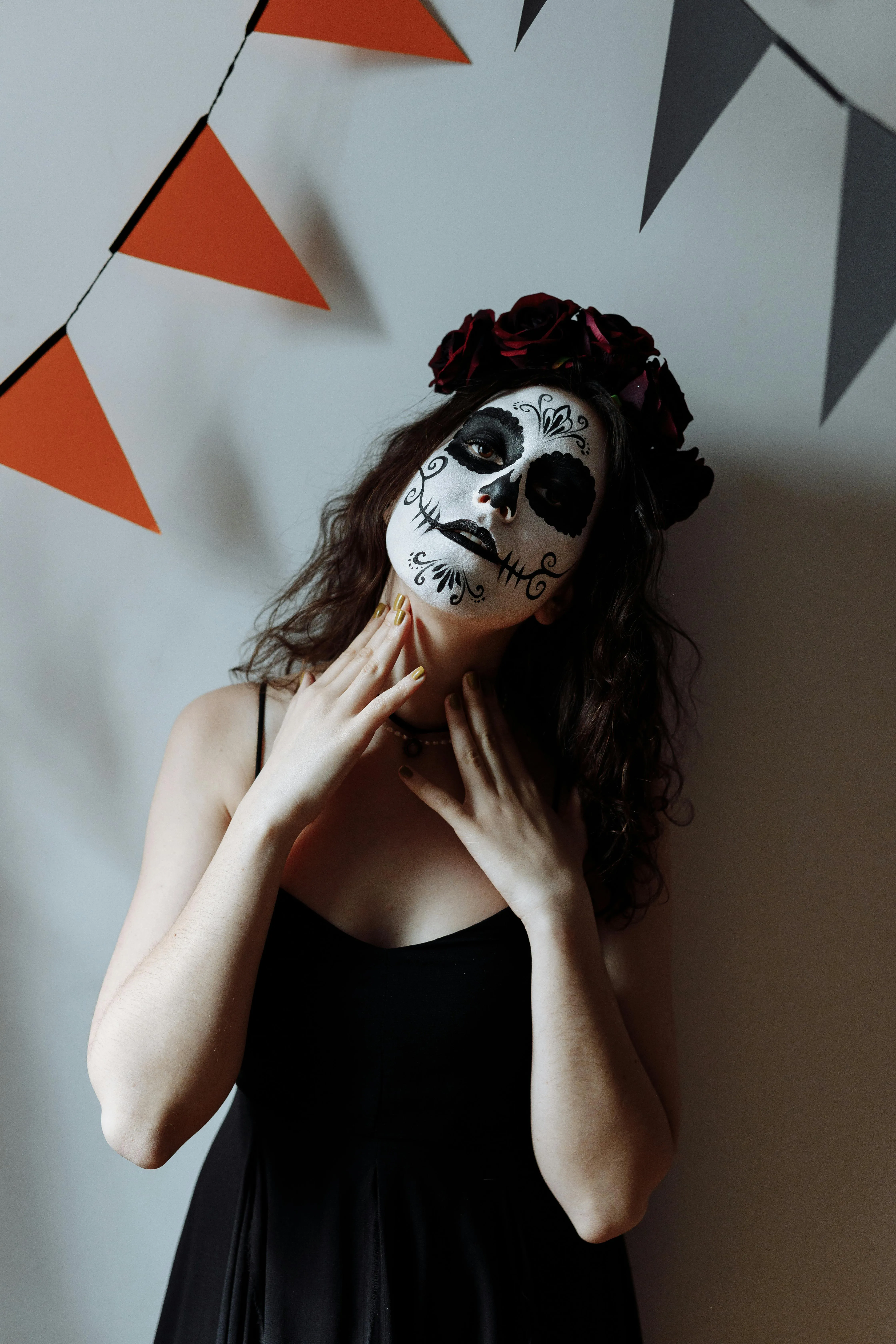 Woman with Skeleton Makeup Posing Indoors for Halloween