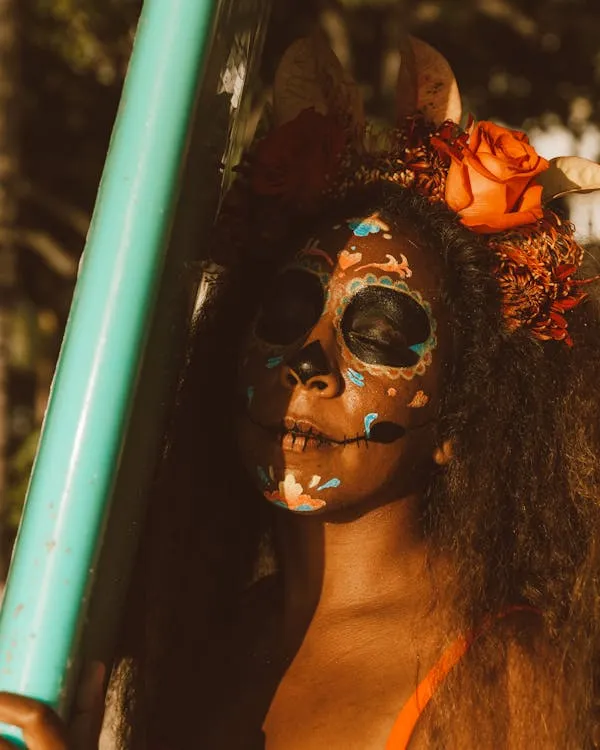 Woman with Sugar Skull Makeup Holding Light Saber HD