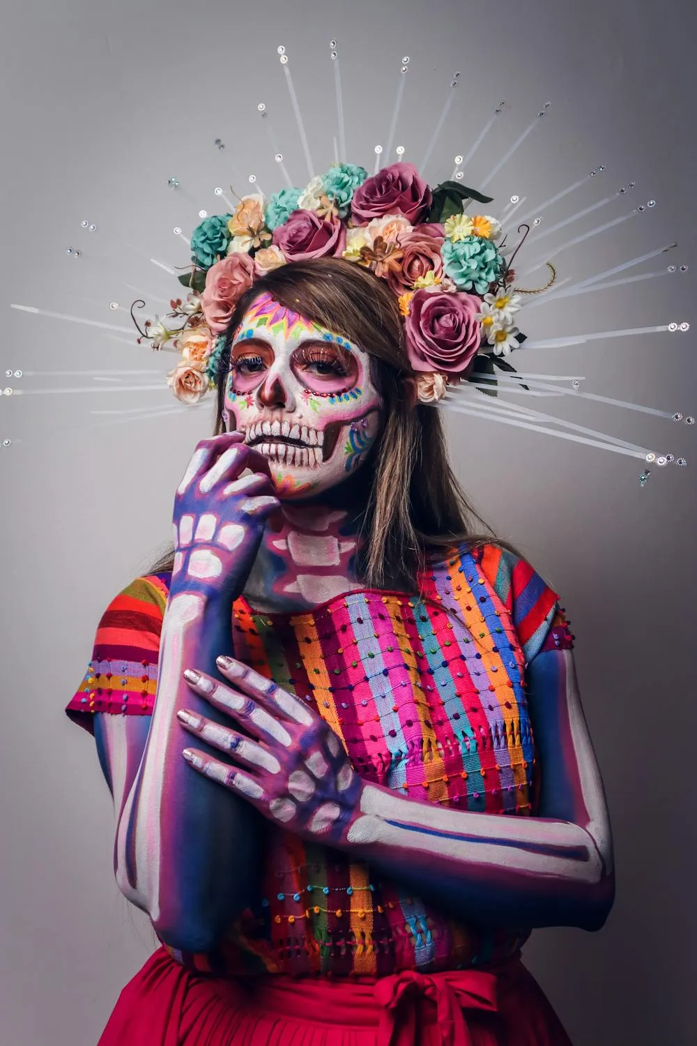 Women in Colourful Day of the Dead Face and Flower Crown