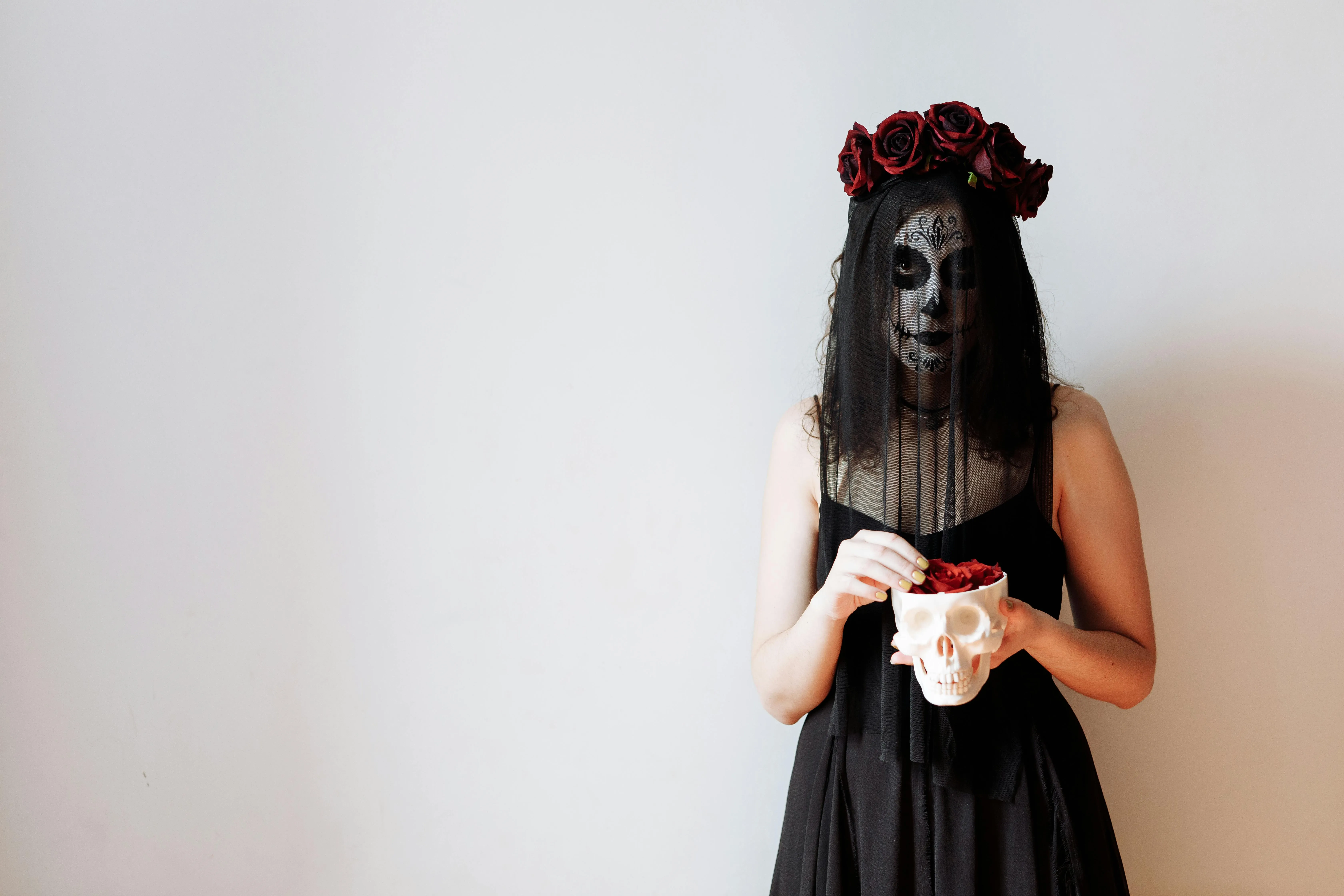 Women in Dark Veiled Costume for Mysterious Halloween Festival