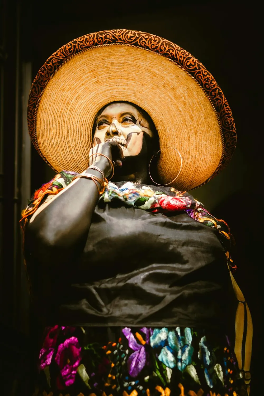 Women in elegant Catrina Costume with Traditional Hat