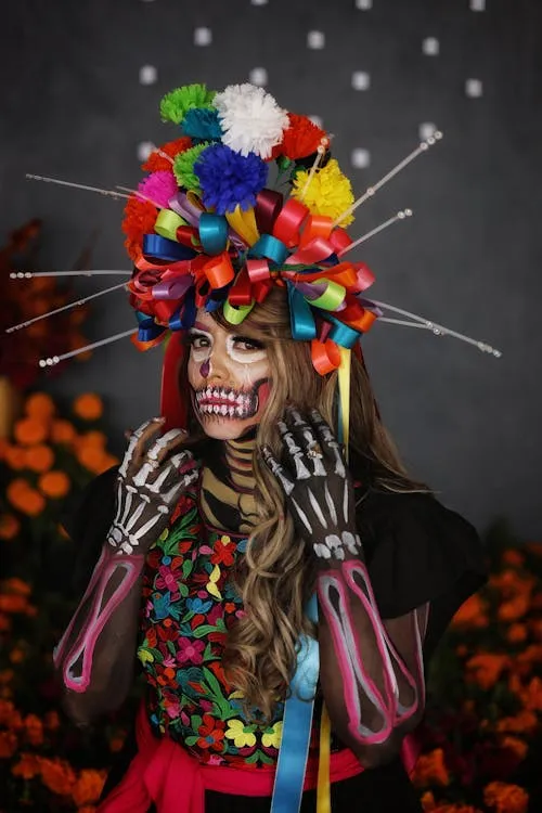Women in Floral Headpiece with Sugar Skull Makeup HD
