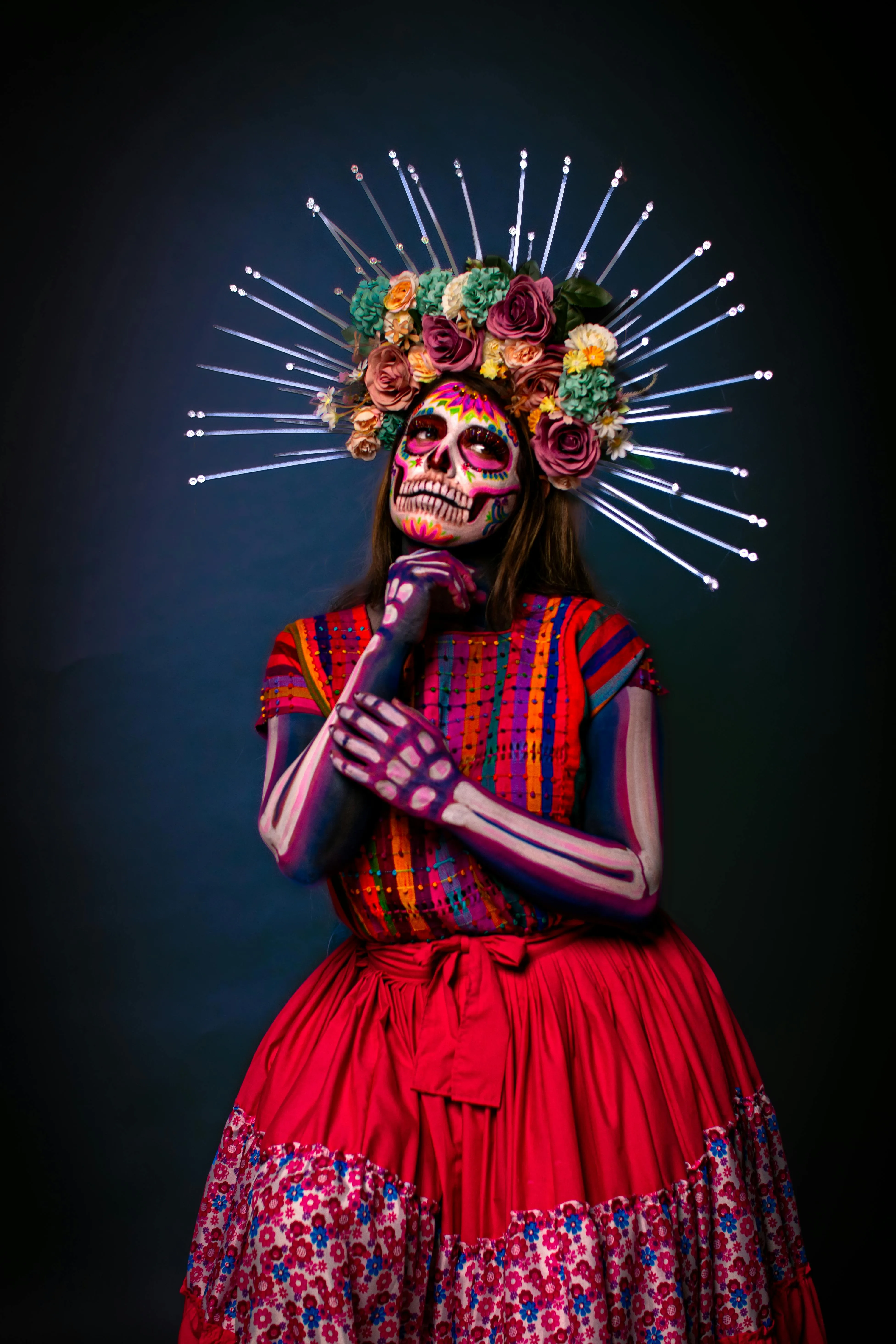 Women in Vibrant Traditional Costume with Skeleton Makeup