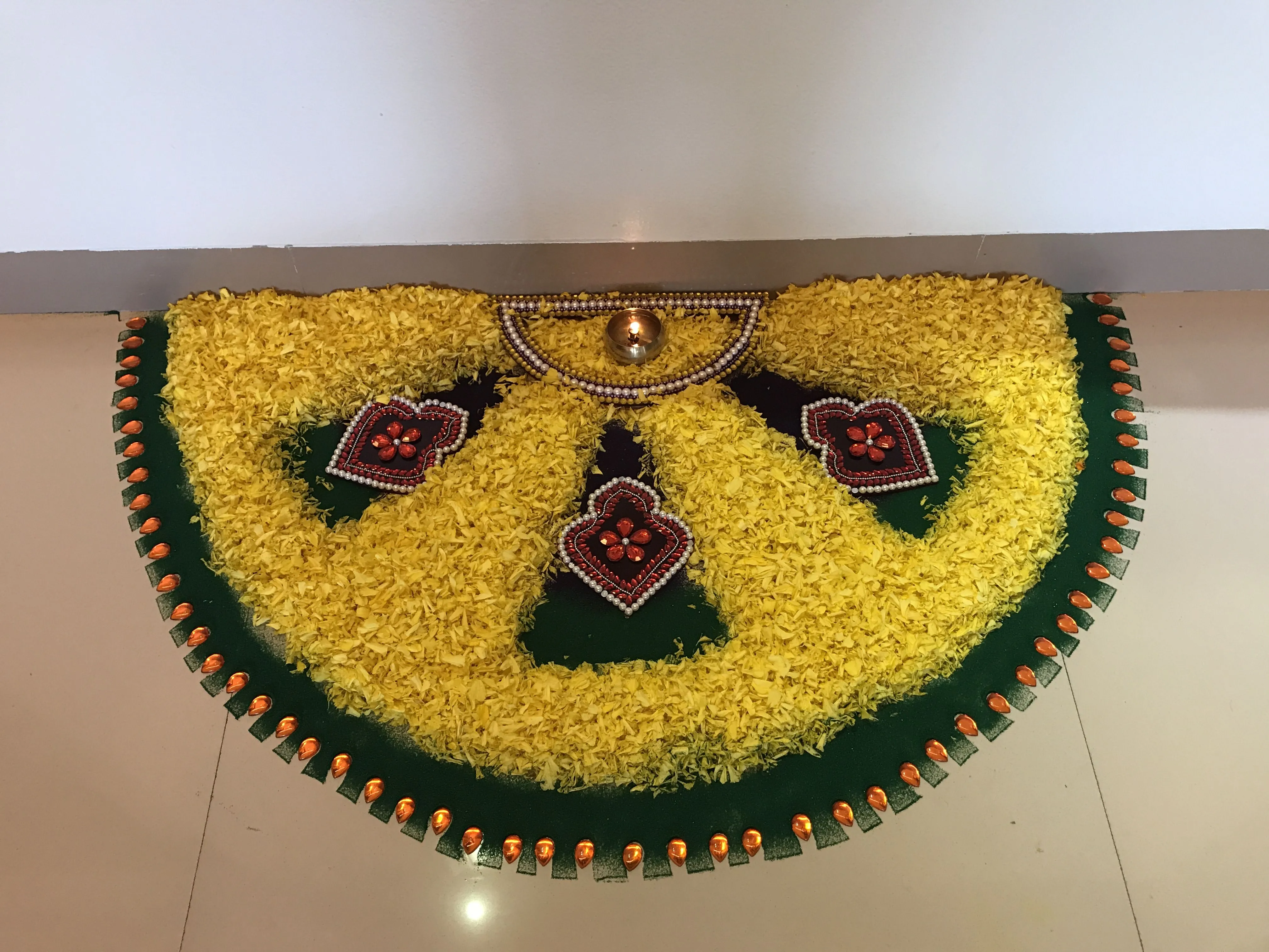 Yellow with green half circle pookolam Design for Onam HD