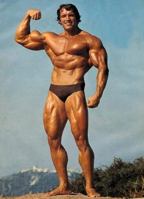 Arnold Bodybuilder Flexing Muscles Outdoors With Confidence