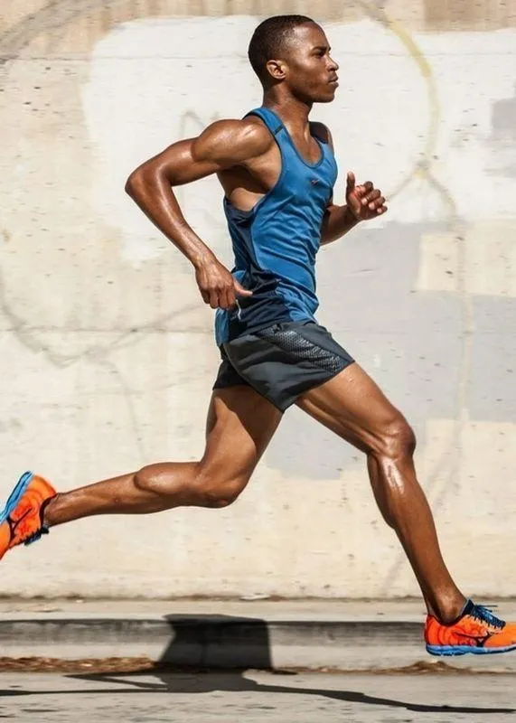 Athletic Man Running Outdoors During a Fitness Workout
