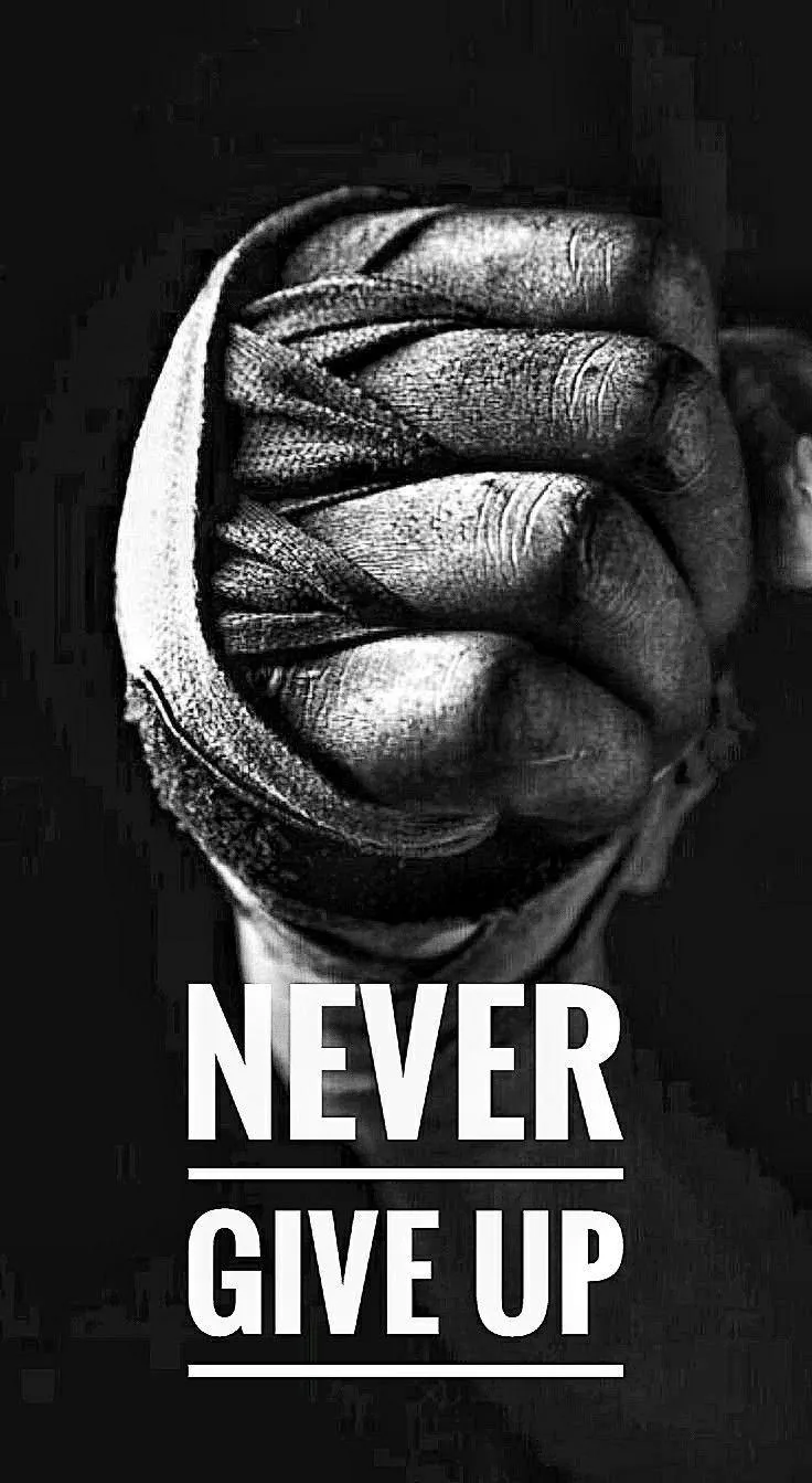 Black Poster With Clenched Fist Saying Never Give Up