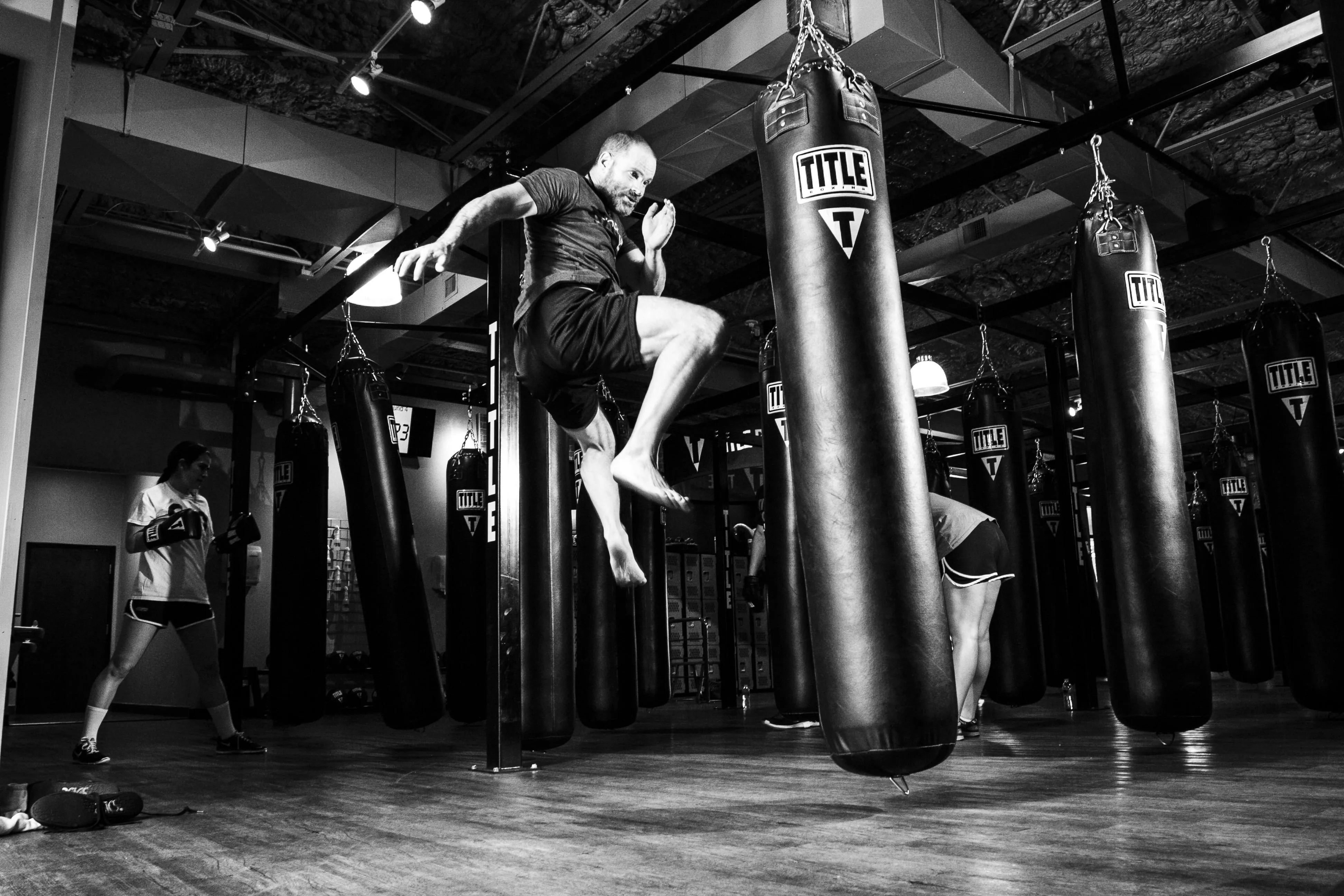 Boxing Training Session Inside a Punching Bag Area Wallpaper